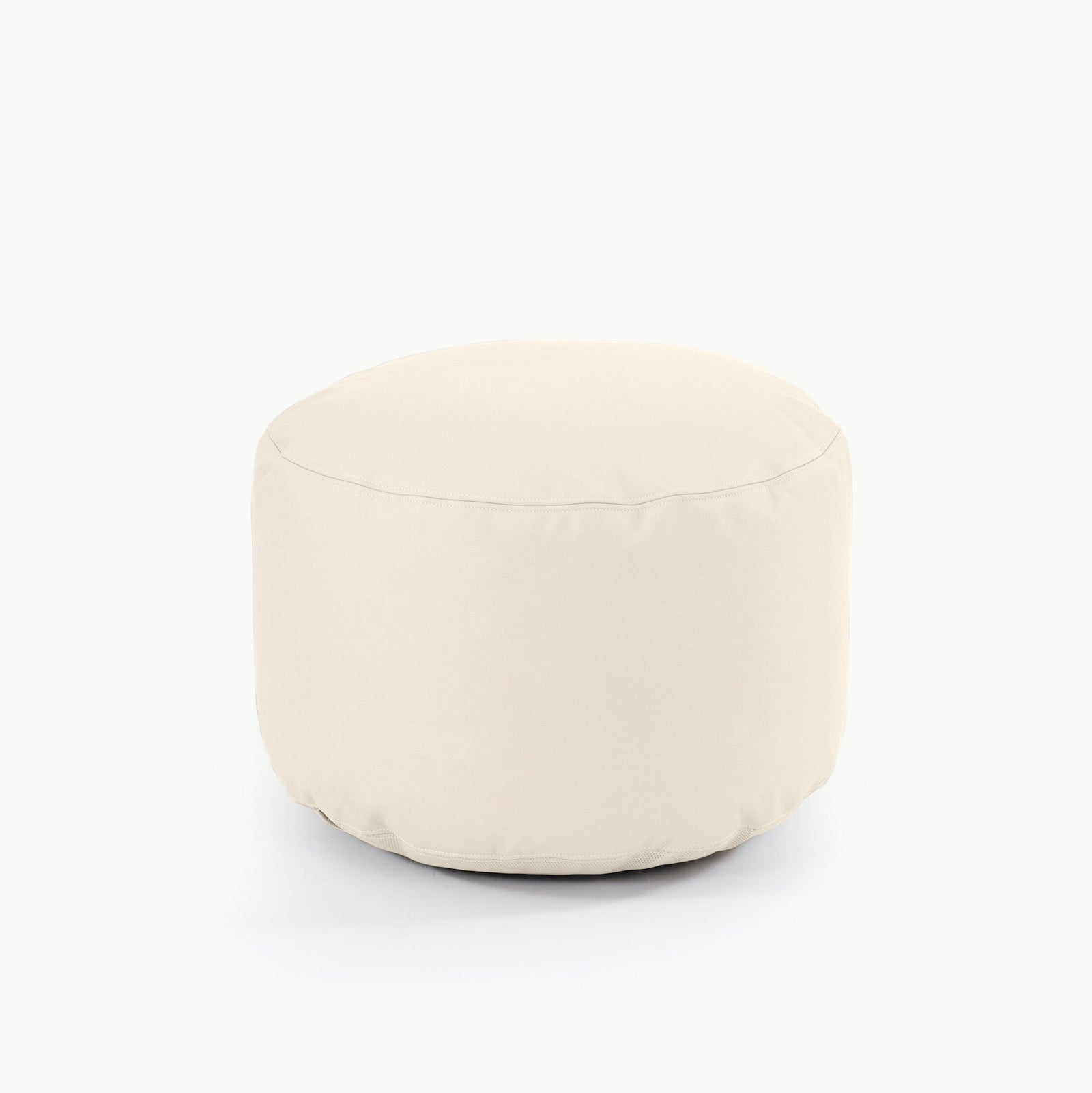 The Gathre Wholesale Pouf, a round, cream-colored fabric ottoman with a smooth surface, sits on a plain white background.