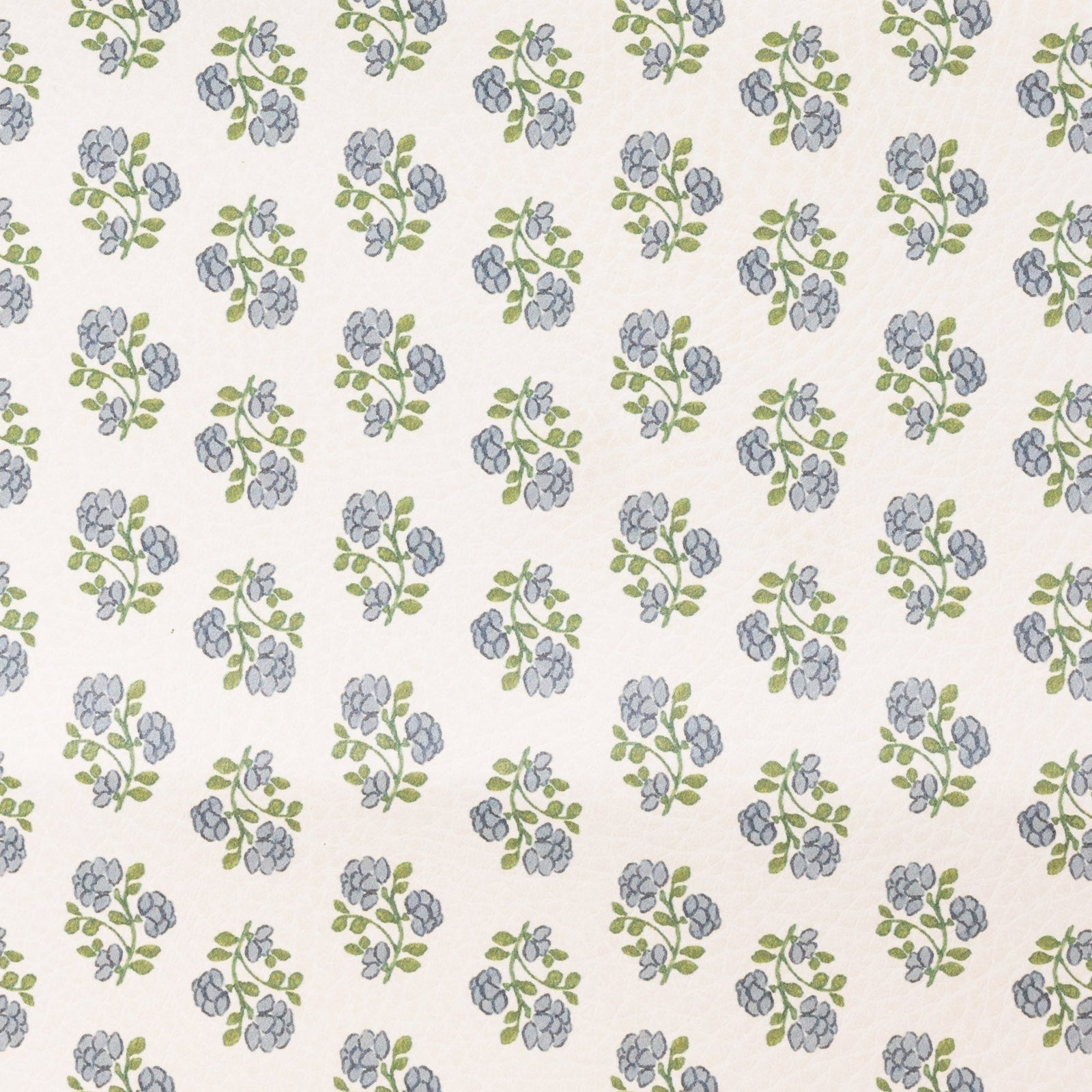 The Gathre Wholesale Floor Cushion features a pattern of small, repeating blue flowers with green leaves on a light beige background. Floral clusters are evenly spaced and arranged in neat rows for a tidy look.