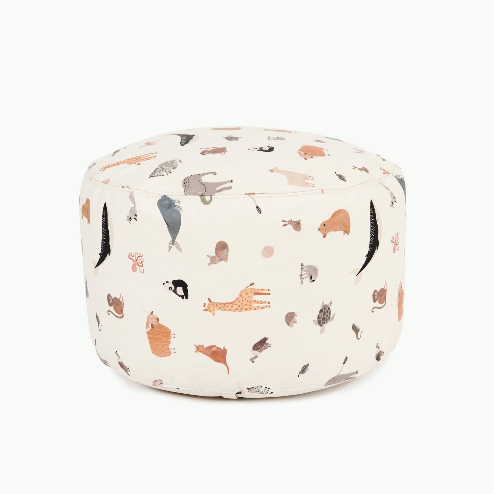 The Gathre Wholesale Pouf is a round, cream-colored ottoman featuring illustrated foxes, giraffes, whales, and bears on a plain white background.