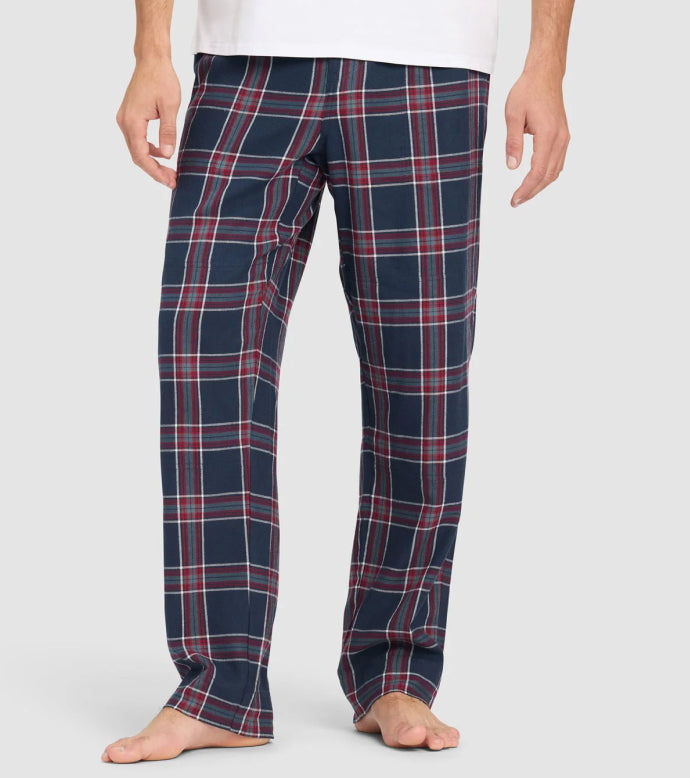 Navy and red plaid pajama Cozy Earth Farmhouse Pajama Pants worn by a person on a white background