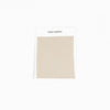 A square fabric sample from Cozy Earth, identified as the Bamboo Sheet Swatch. The swatch is a simple beige color with a zigzag edge design and is attached to a white card. |Color:Driftwood