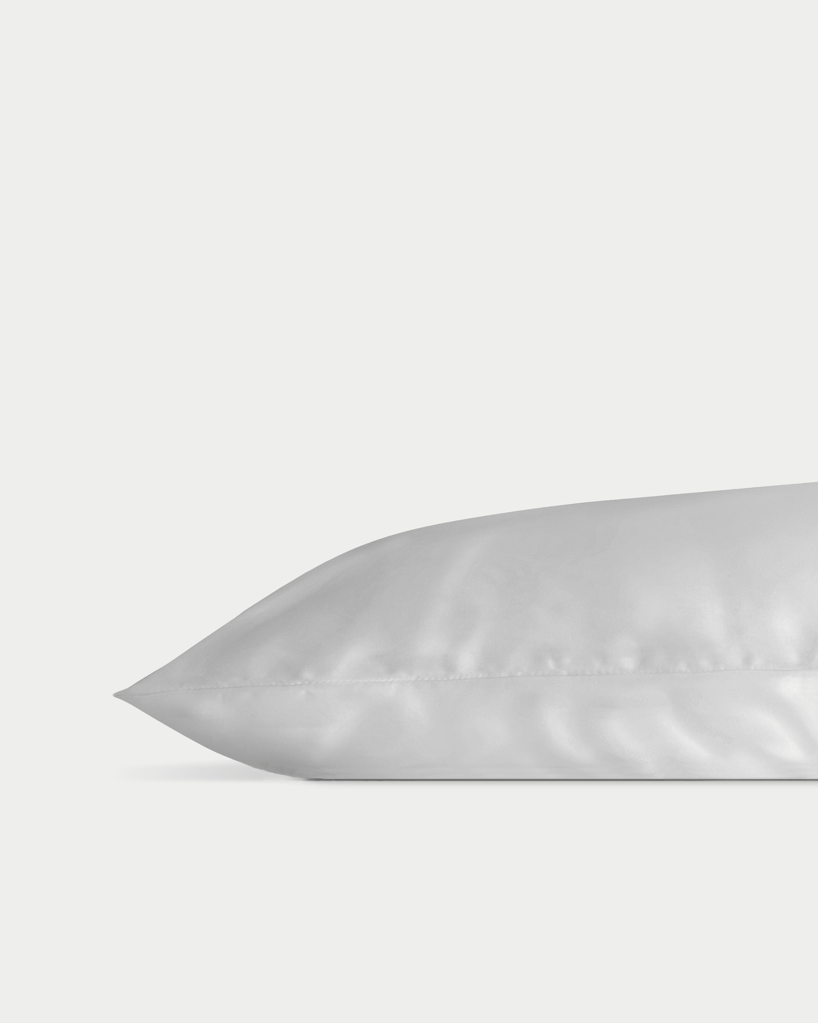 Silver silk pillowcase with white background 