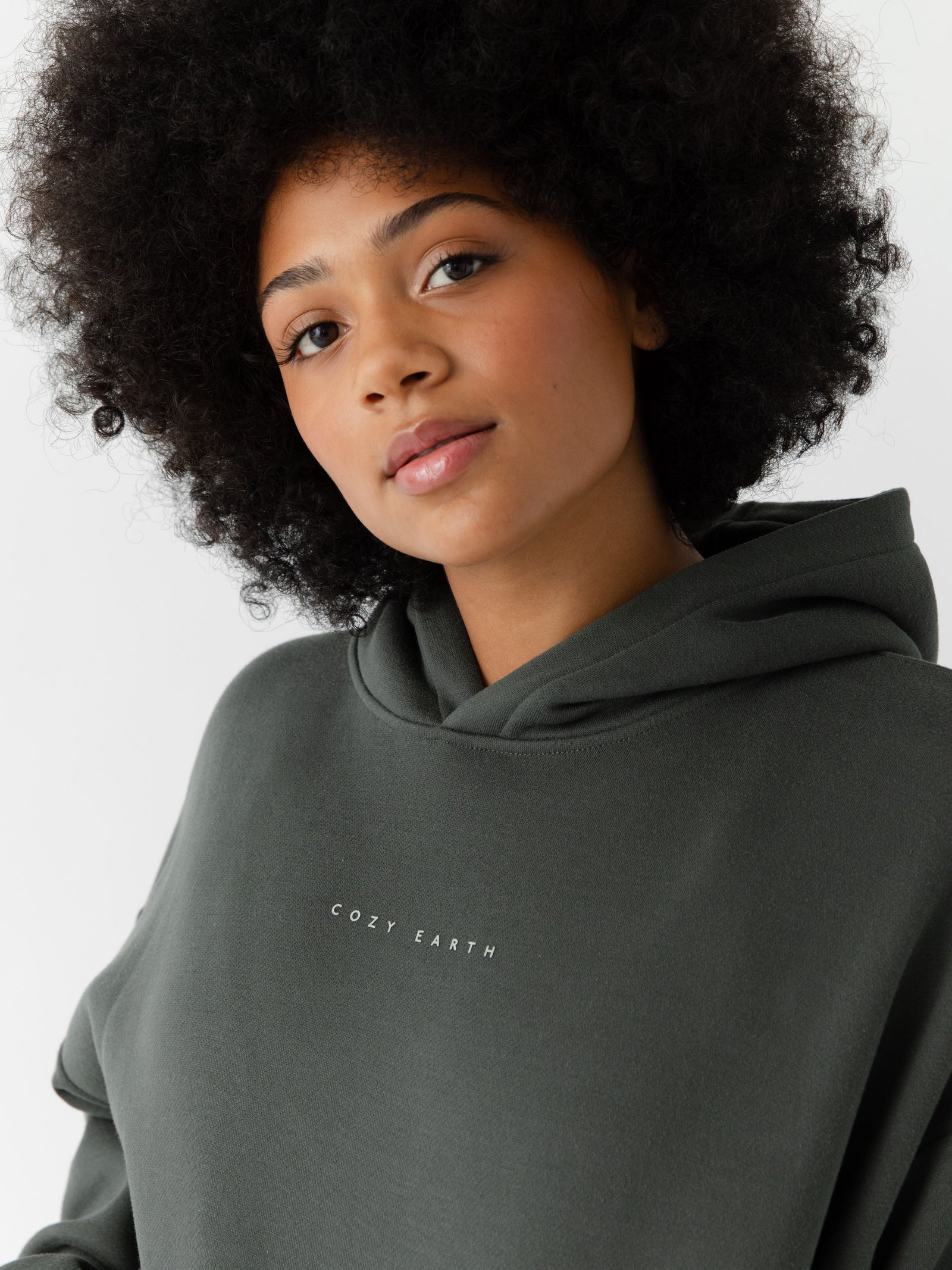 Close up of woman wearing storm cityscape hoodie 