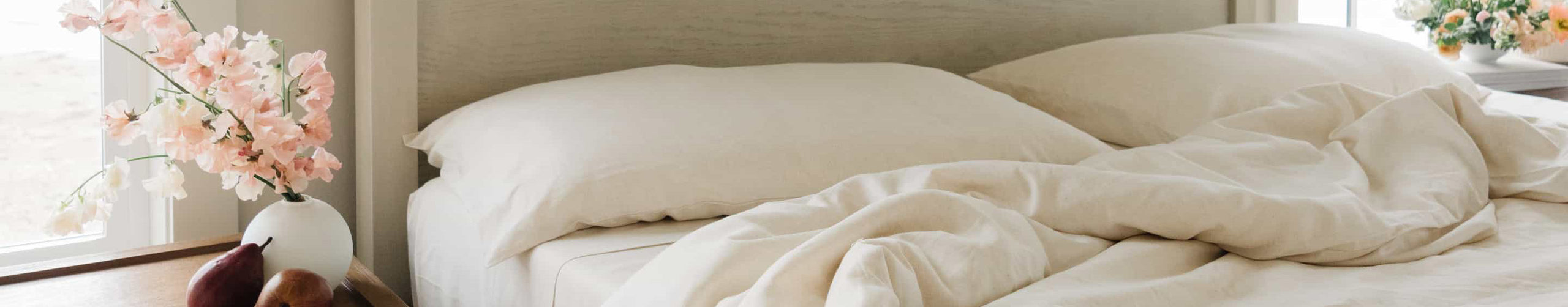 Bed with pillows and sheets