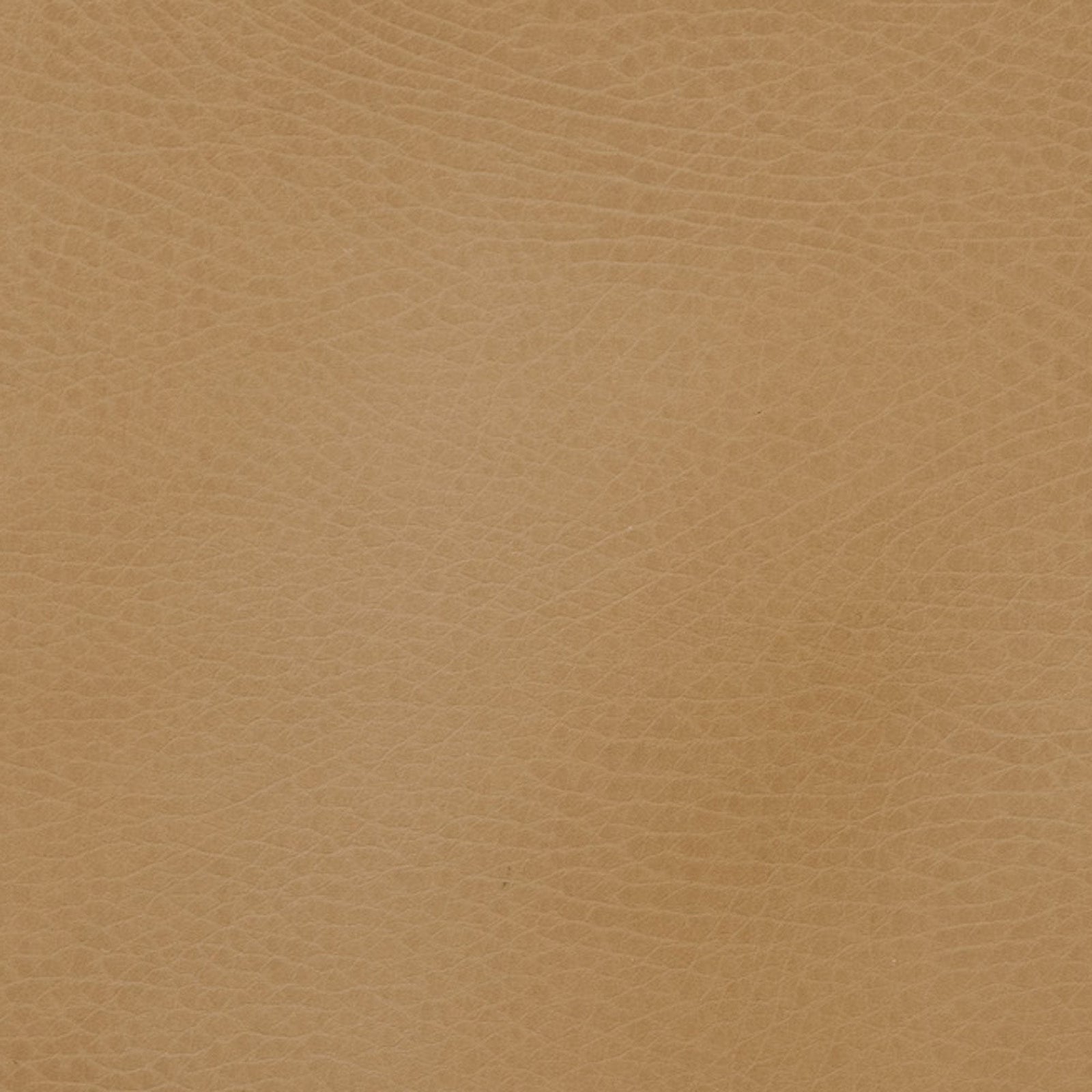 Close-up of the Gathre Wholesale Padded Changing Mat shows its textured light brown leather surface, featuring visible natural grain patterns and subtle creases.