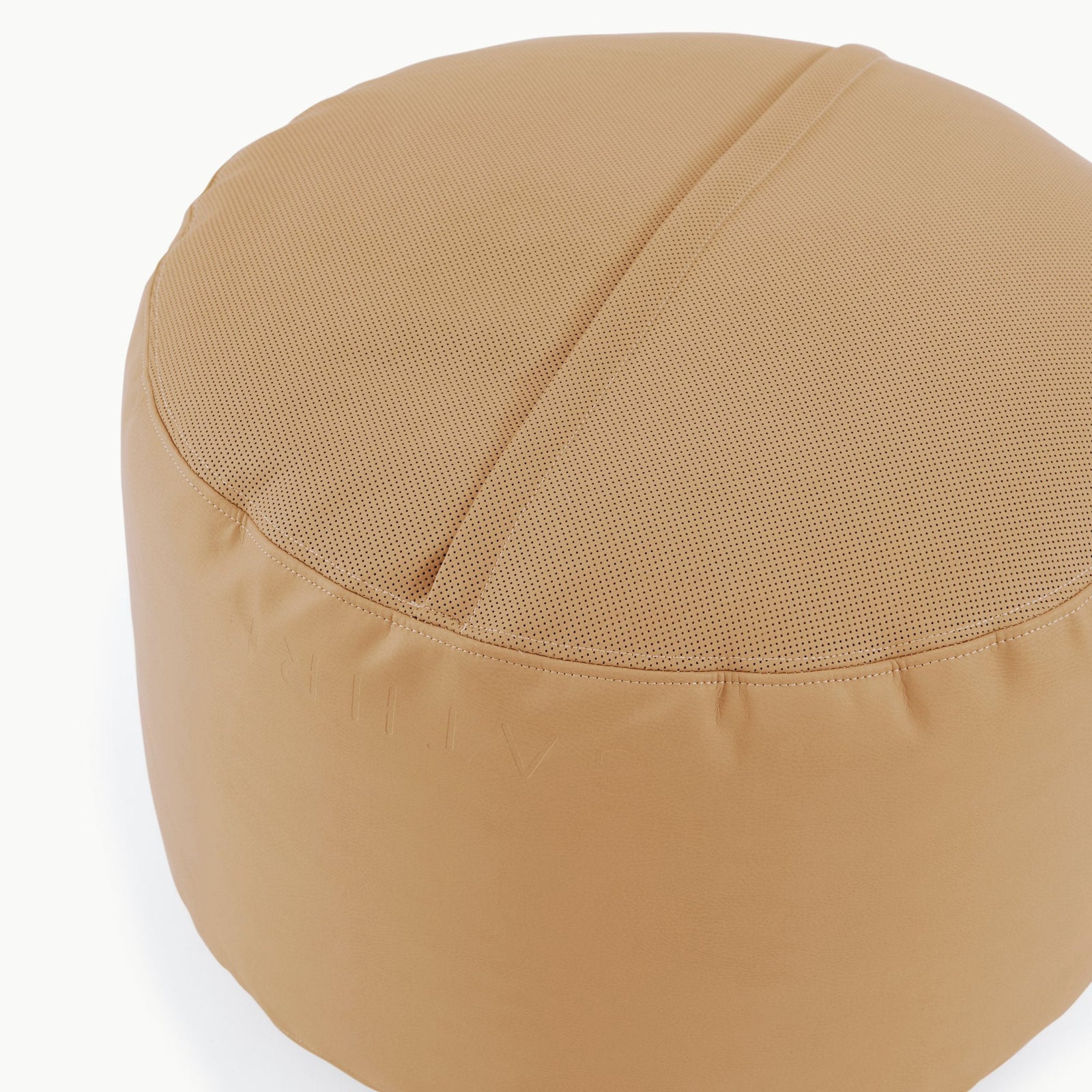 The Gathre Wholesale Pouf is a round, tan fabric ottoman with a subtle top seam, displayed on a plain white background.