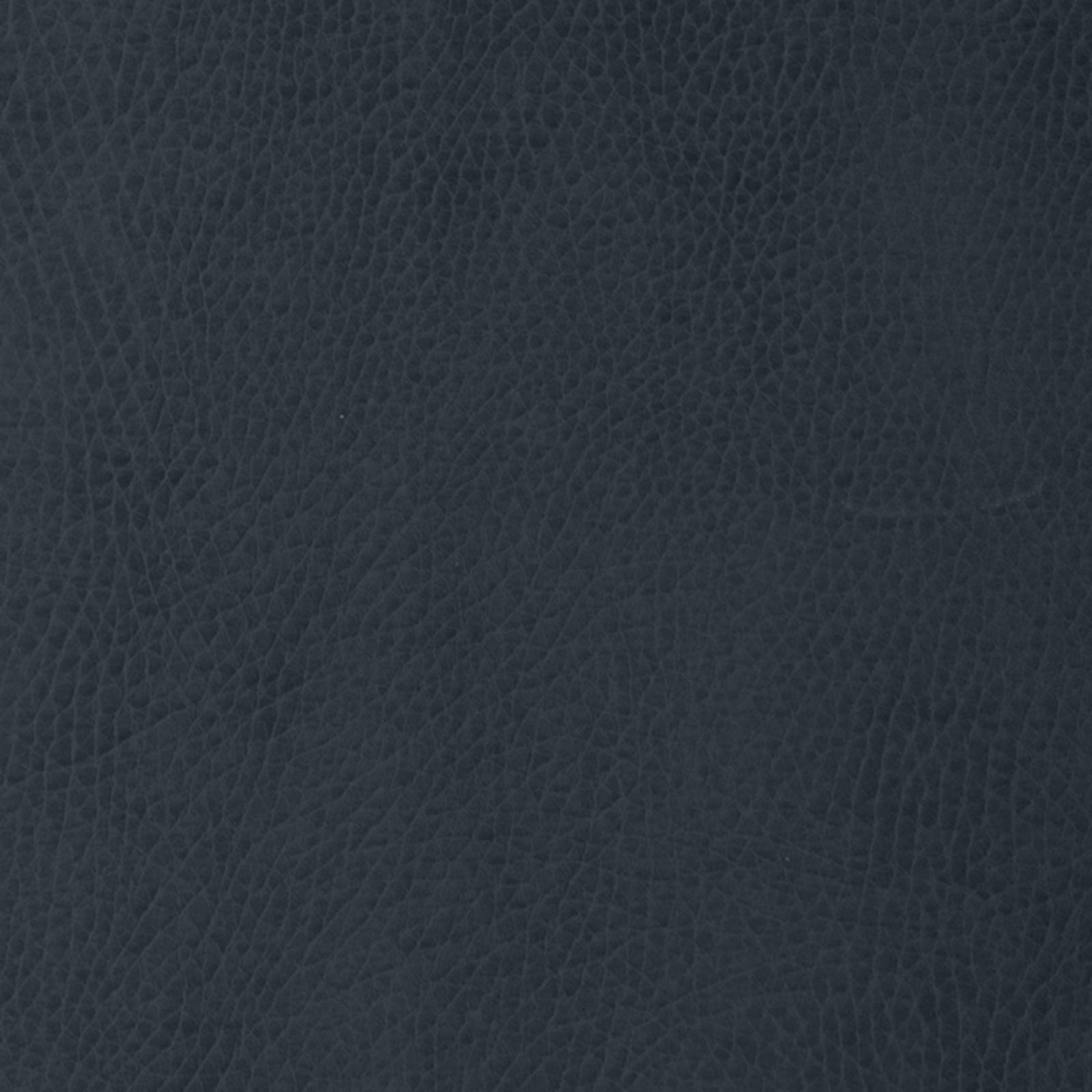 Close-up of Gathre's Wholesale Padded Changing Mat, featuring a dark, textured surface with fine natural grain patterns and subtle shading variations that resemble black leather.