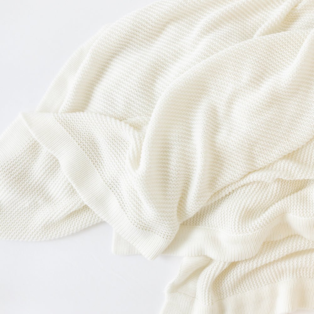 Ivory Cloud Knit Baby Blanket close up 