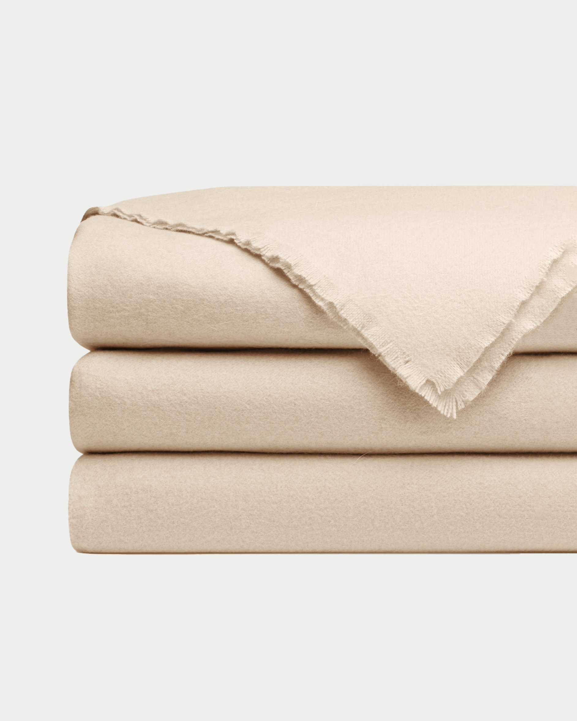 Dune cashmere fringe blanket folded with white background |Color:Dune