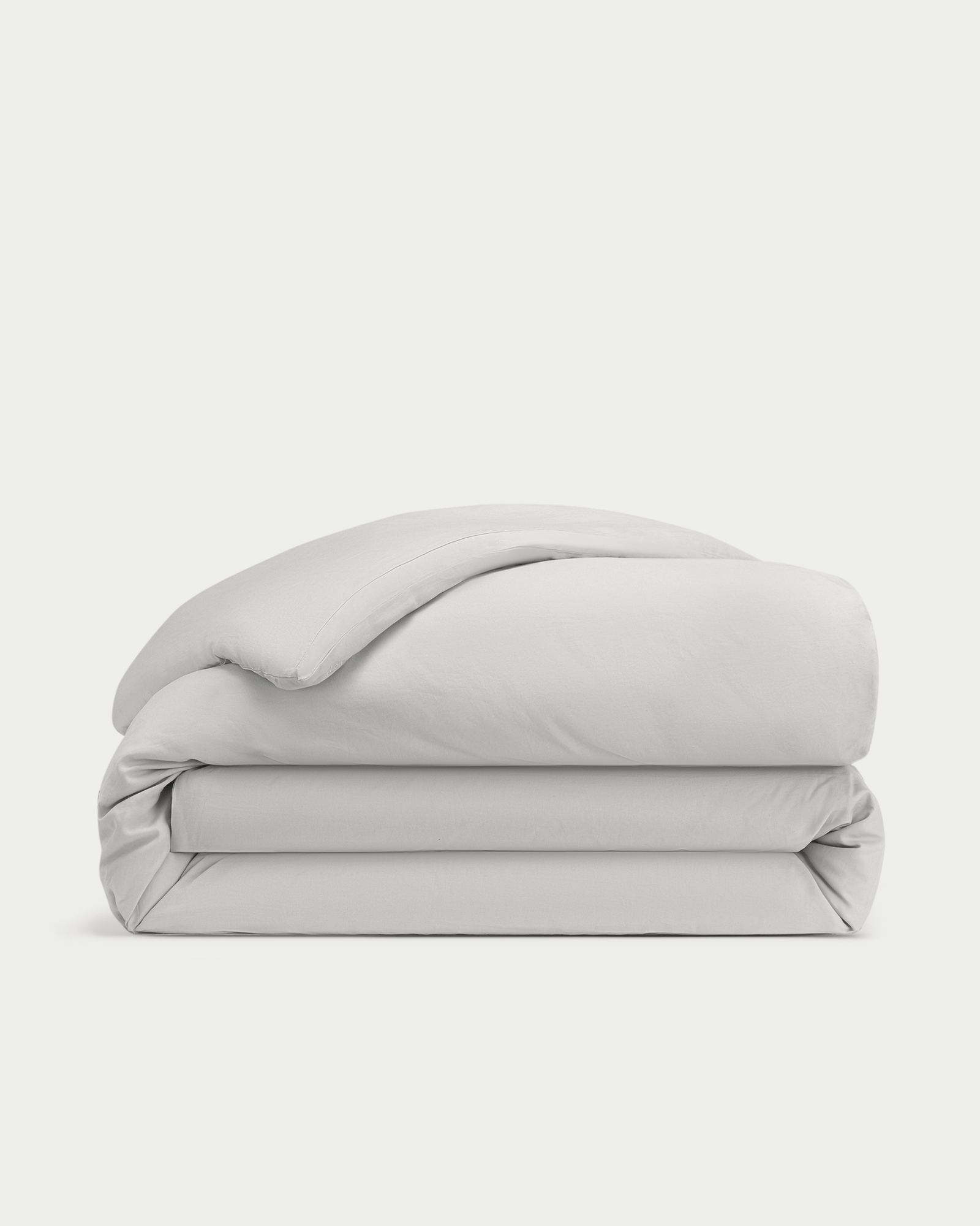 Light Grey Linen Duvet Cover neatly folded over white background.