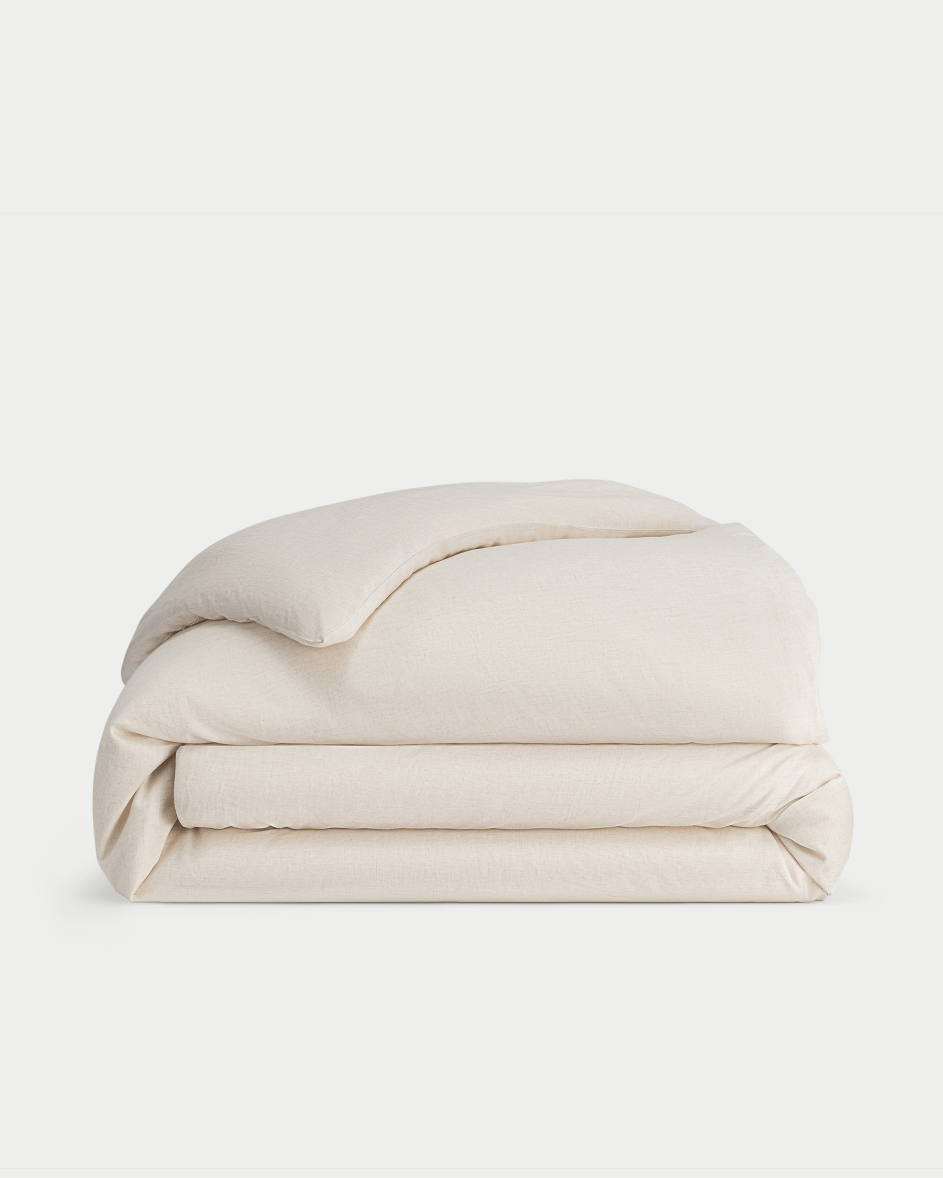 Natural Linen Duvet Cover neatly folded over white background. |Color: Natural