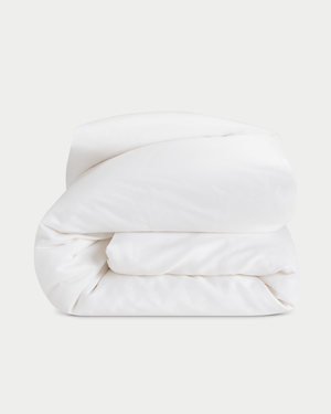 Silk comforter folded up with a white background |Filling:Silk