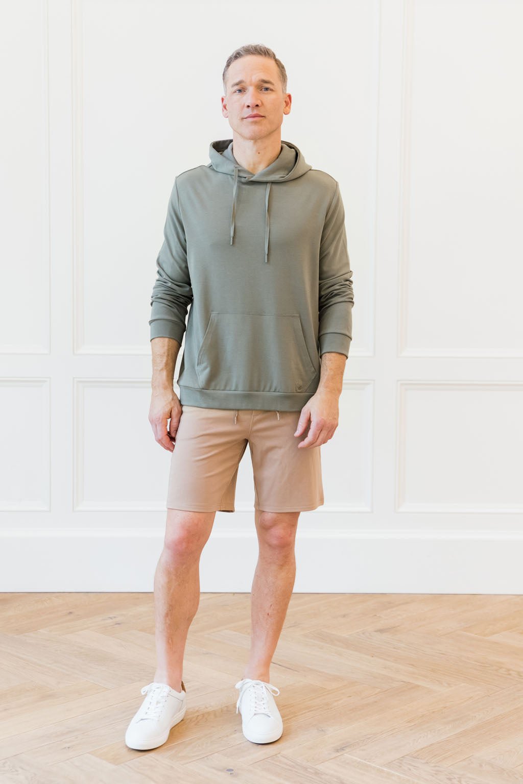 Moss Bamboo Hoodie. Photo of hoodie taken in front of white background.