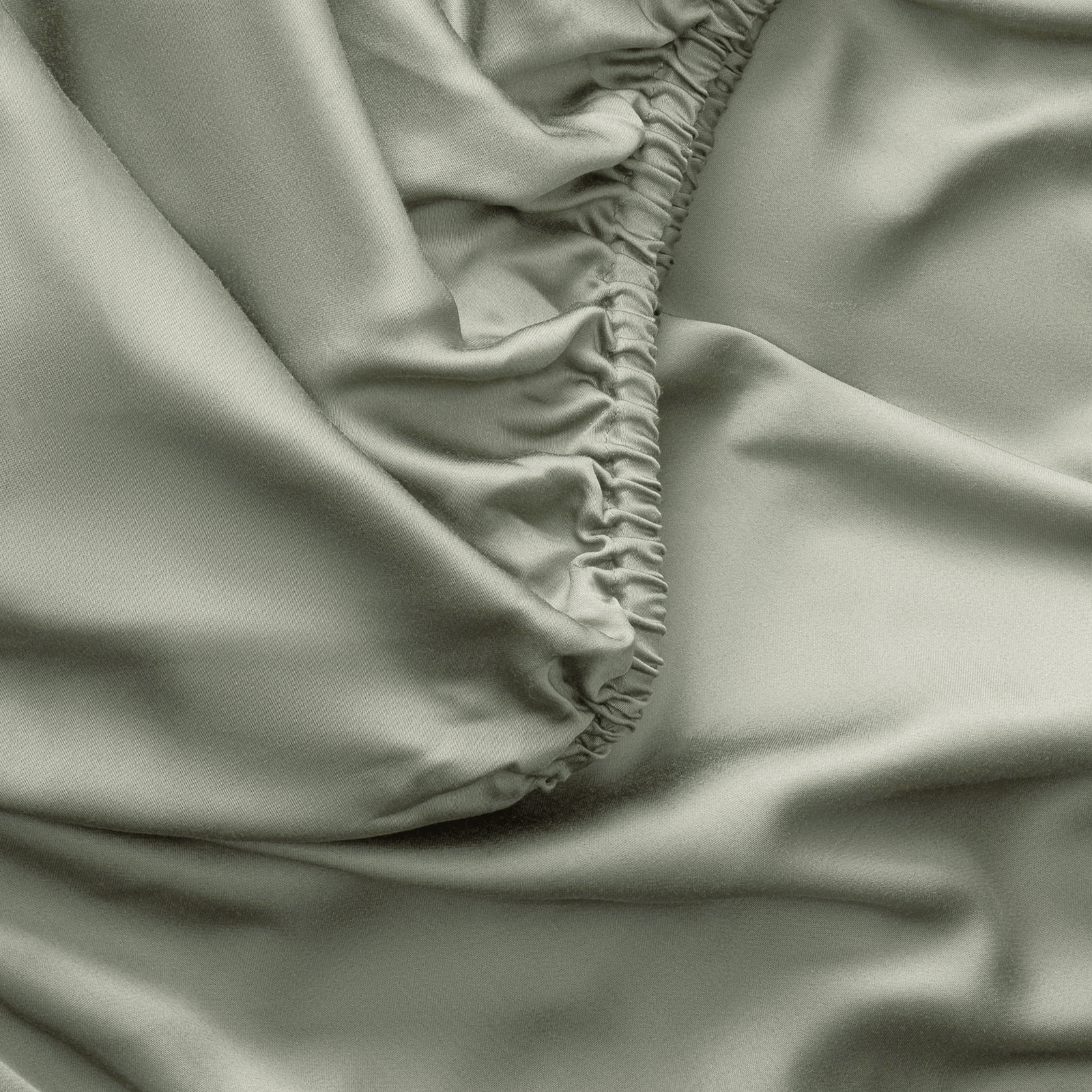 Close up of sage fitted sheet 