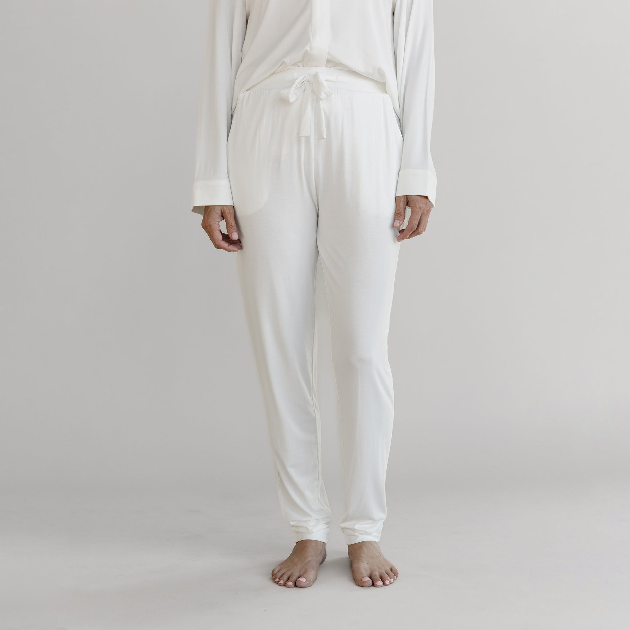 Gray Cozy Earth Stretch Knit Tapered Pant set worn by a person on a light gray background |Color:Ivory