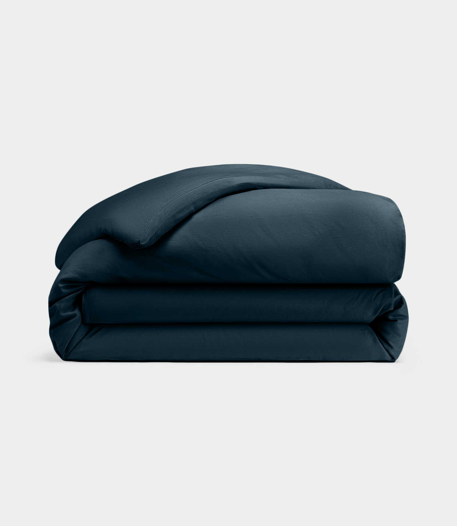 Navy Linen Duvet Cover neatly folded over white background.