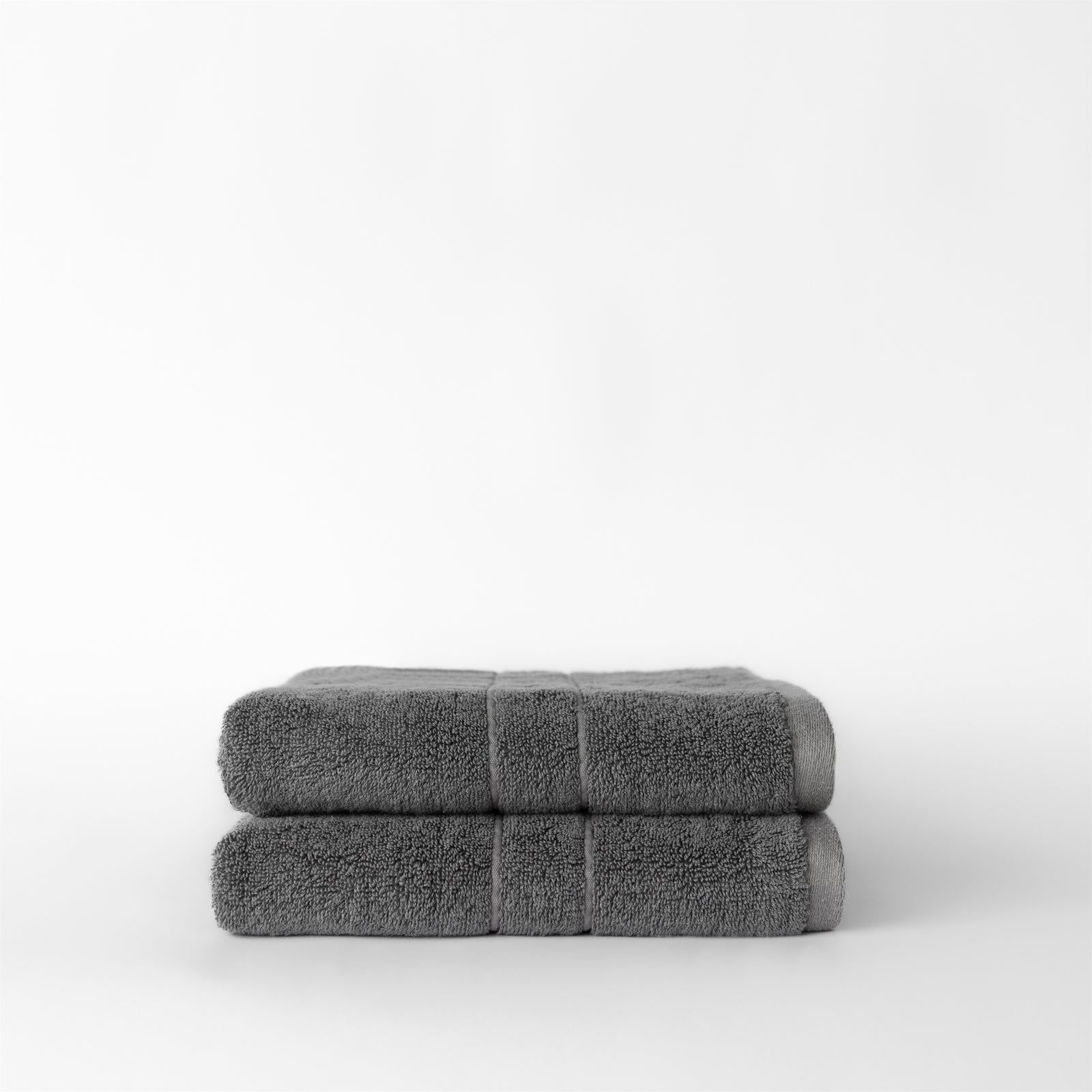 Premium Plush Hand Towels in the color charcoal. Photo of Complete Premium Plush Hand Towel taken with white background