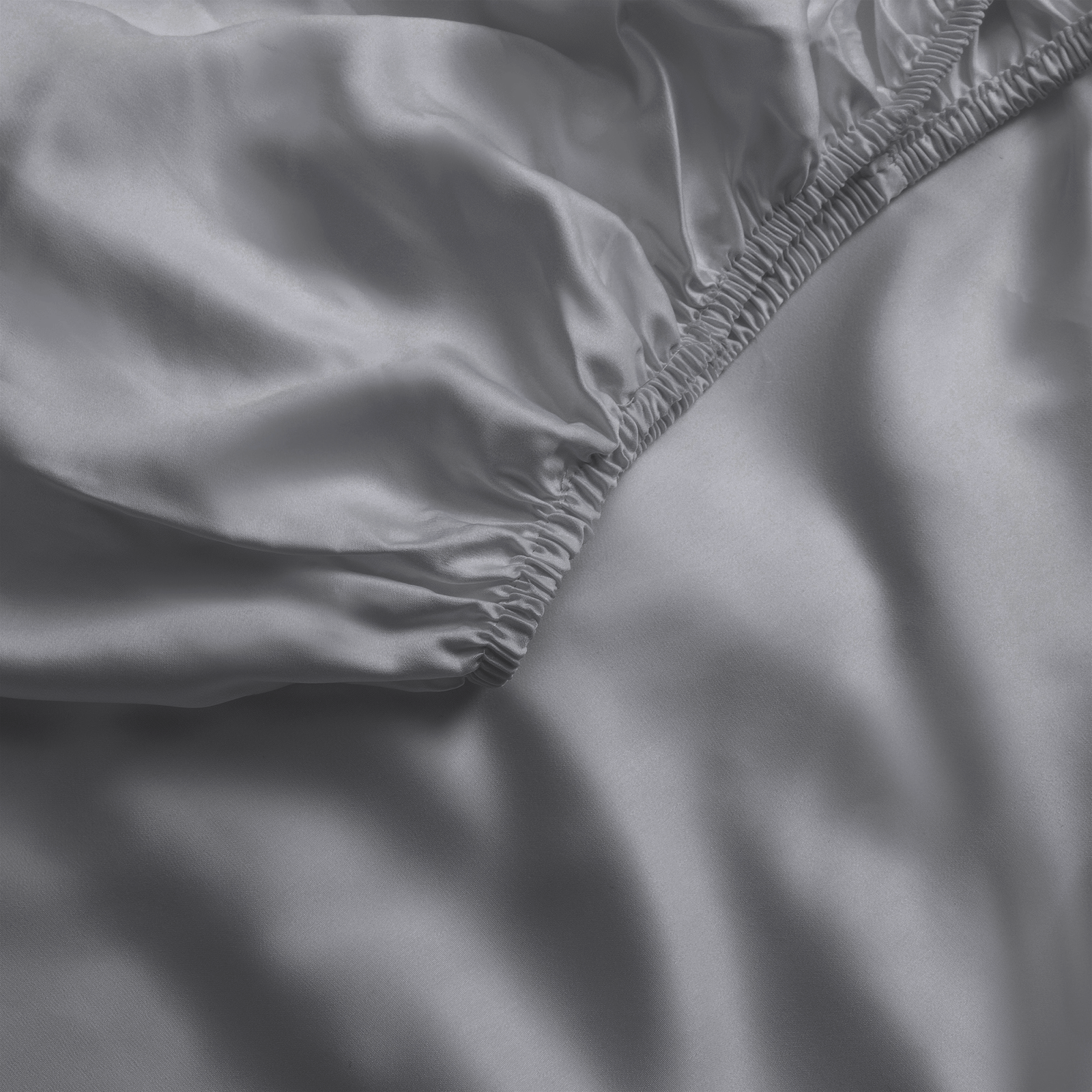 Close up of charcoal fitted sheet 