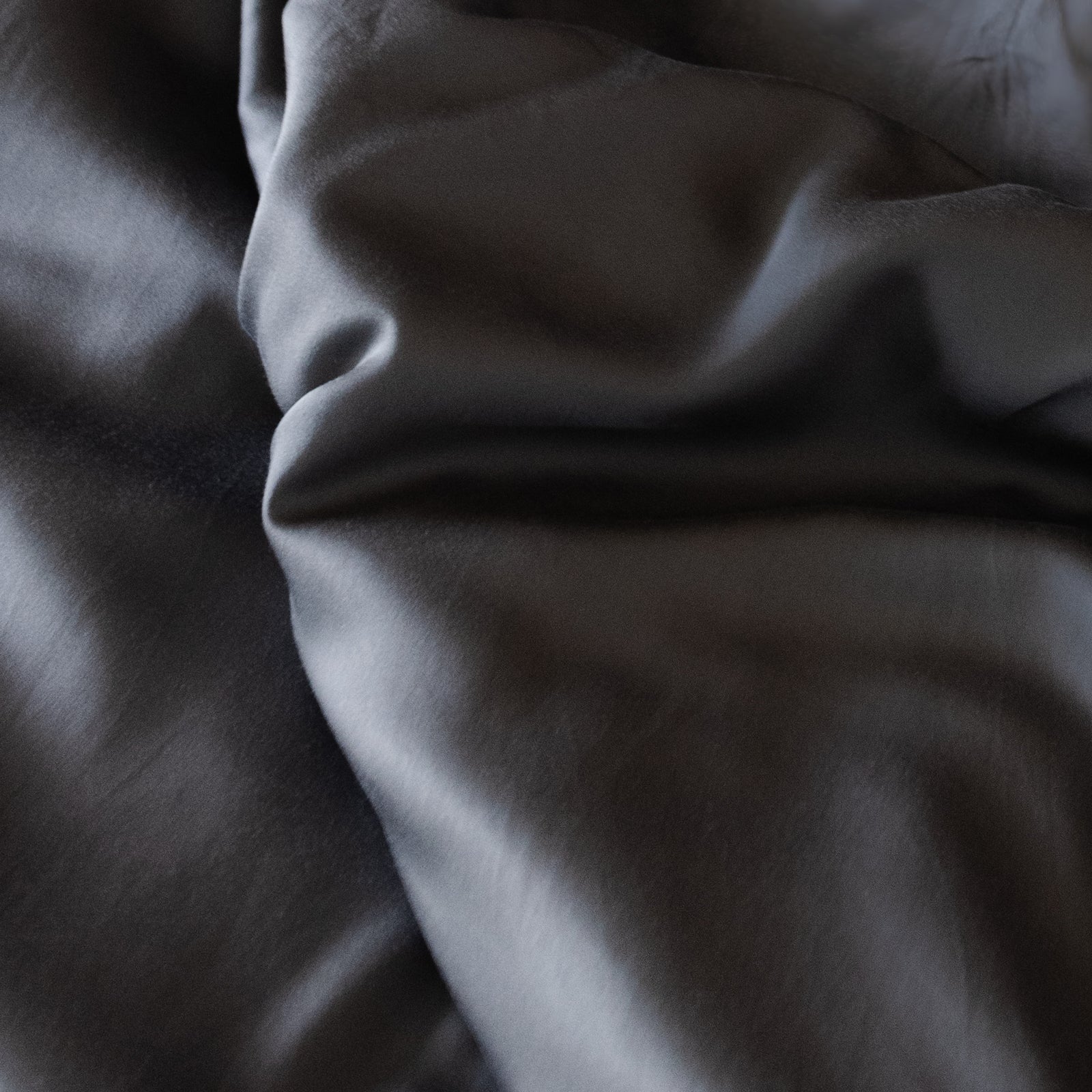 Close up of charcoal flat sheet
