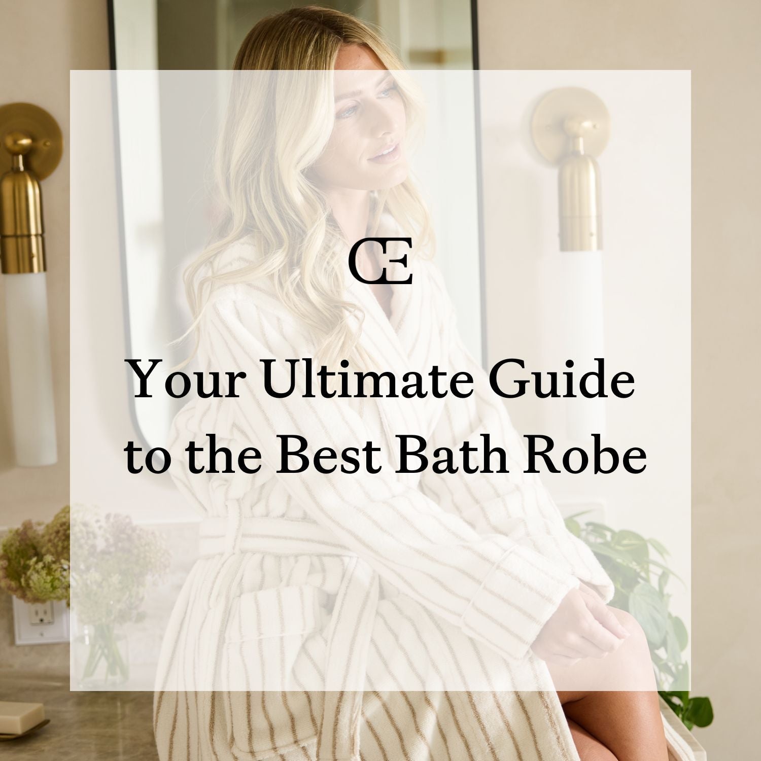 A woman sits on a bathroom counter wearing Cozy Earth Luxe Bath Robe