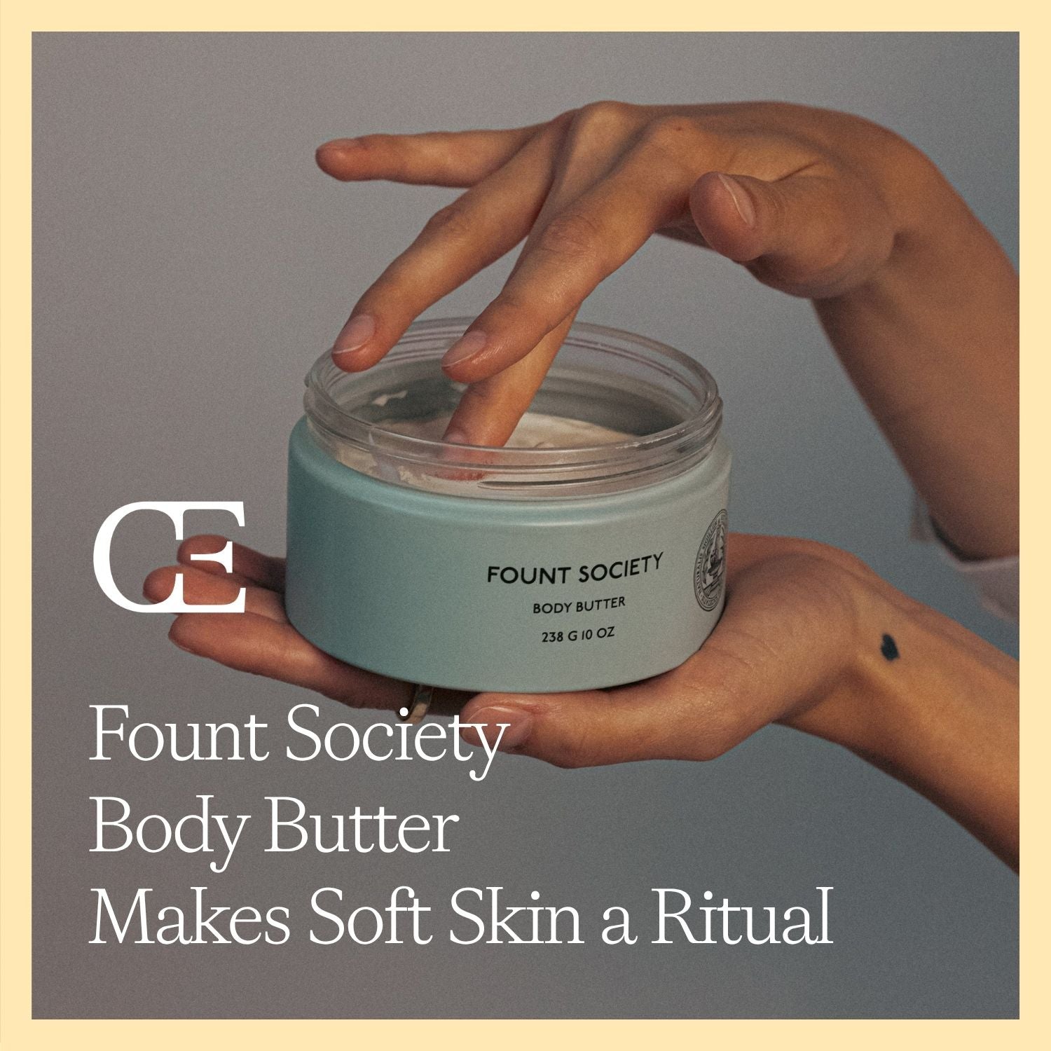 a close up of a hand dipping into a jar of body butter
