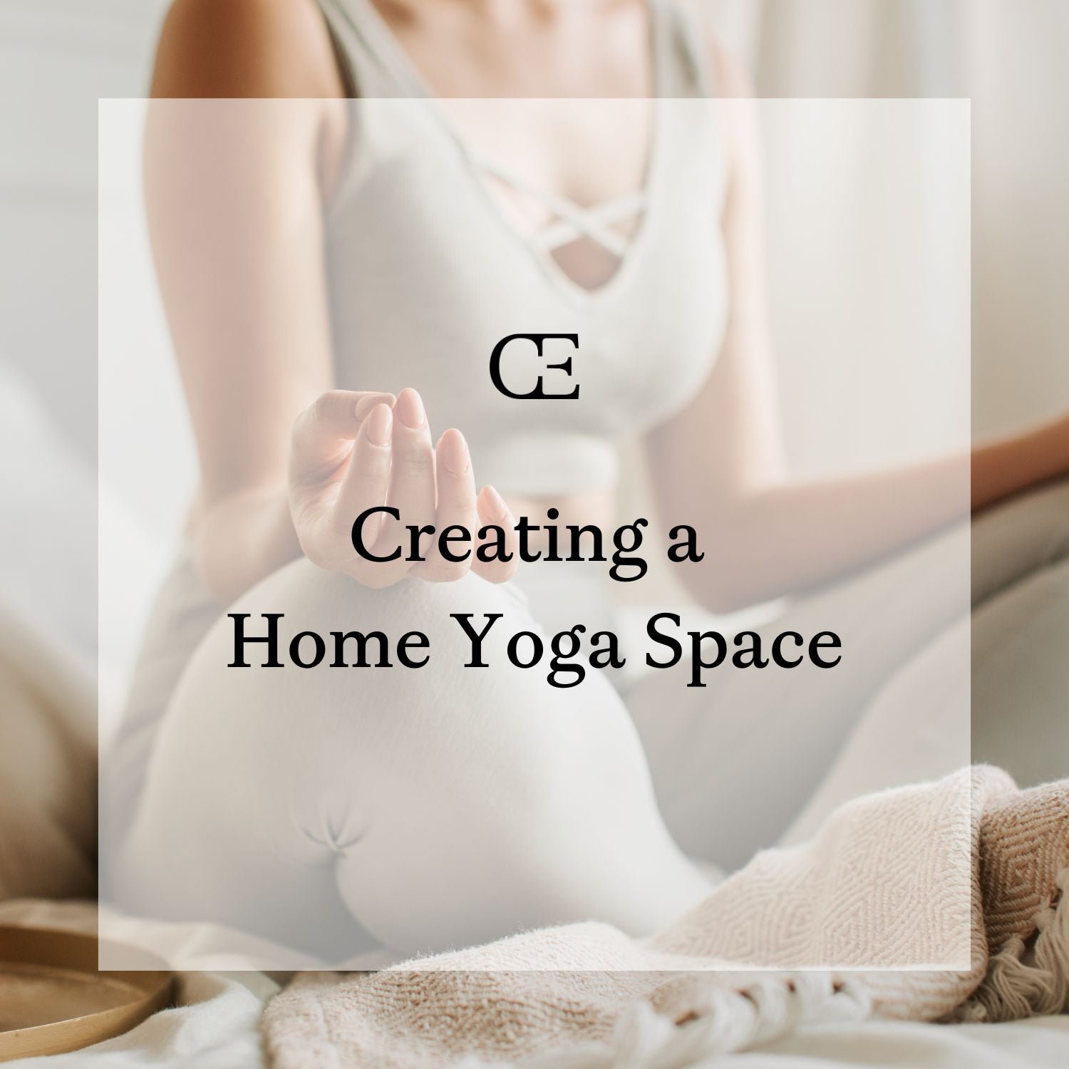 A woman from the neck down sits in a meditative yoga pose
