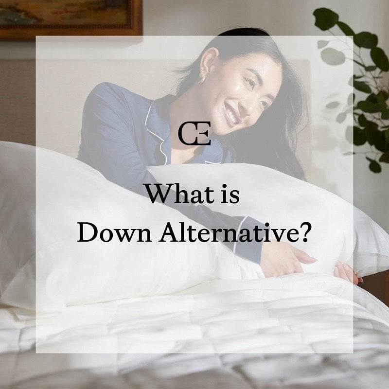 Woman hugging pillow in bed