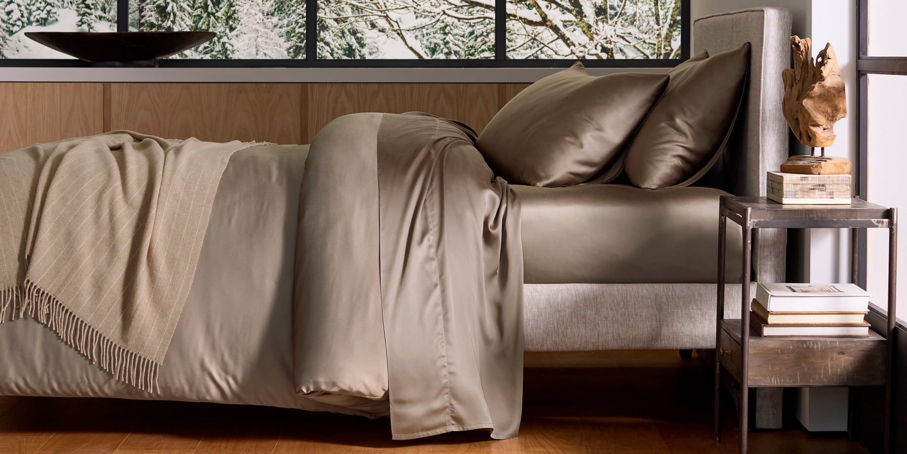 a bed featuring light brown Cozy Earth bedding