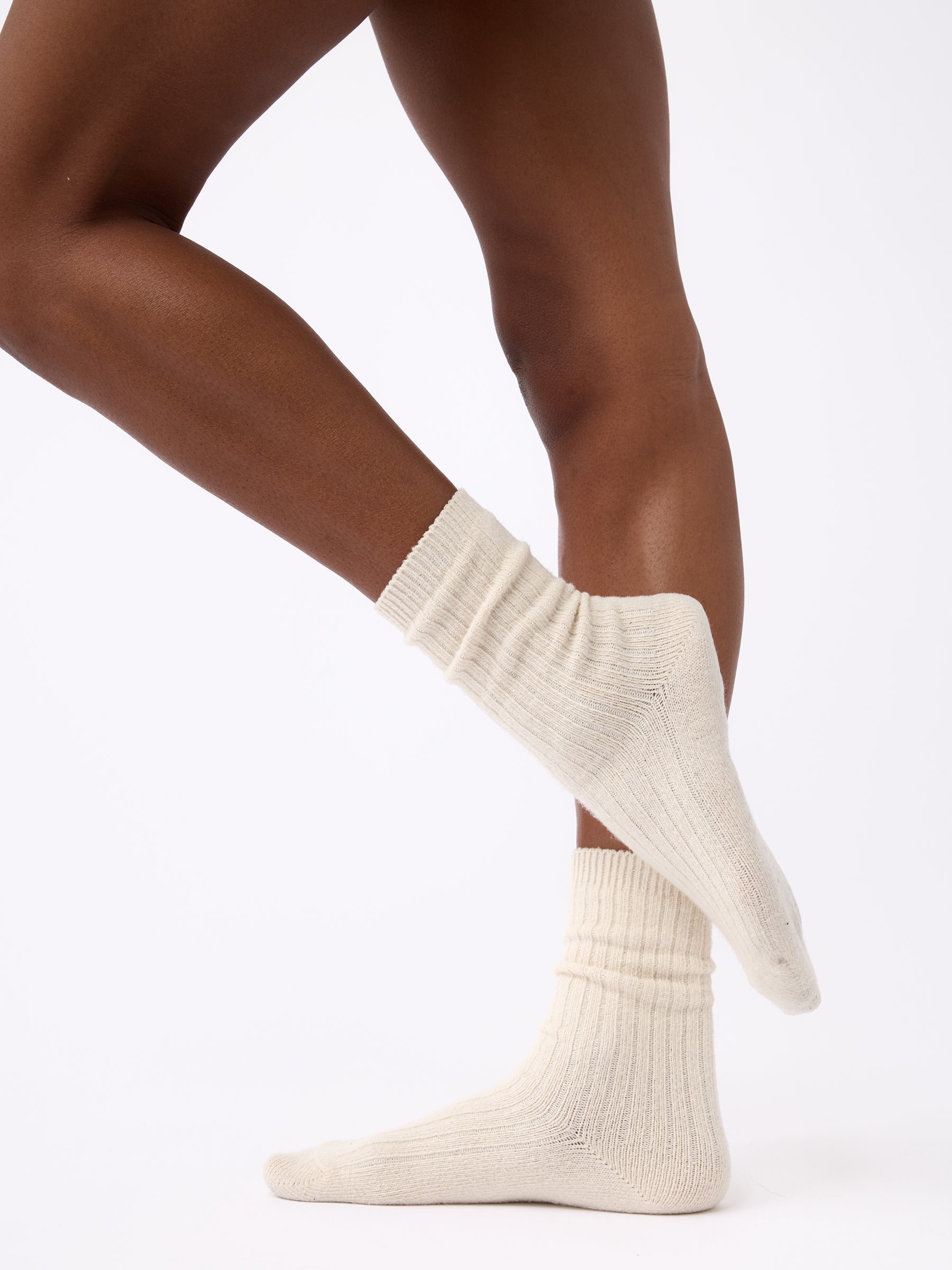 Person wearing Cozy Earth Plush Lounge Sock in Alabaster 