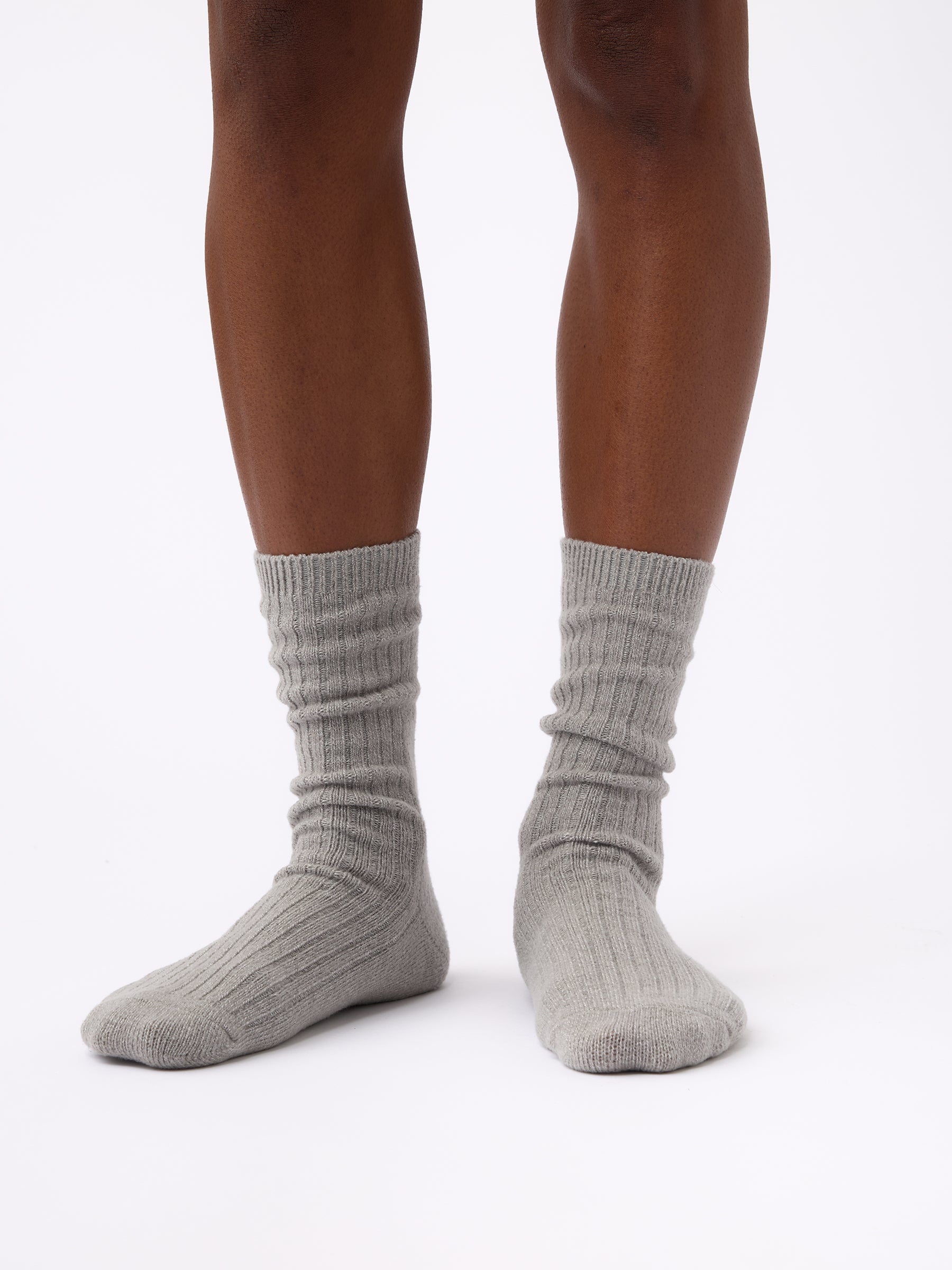 Person wearing Cozy Earth Plush Lounge Calf Sock in Stone 