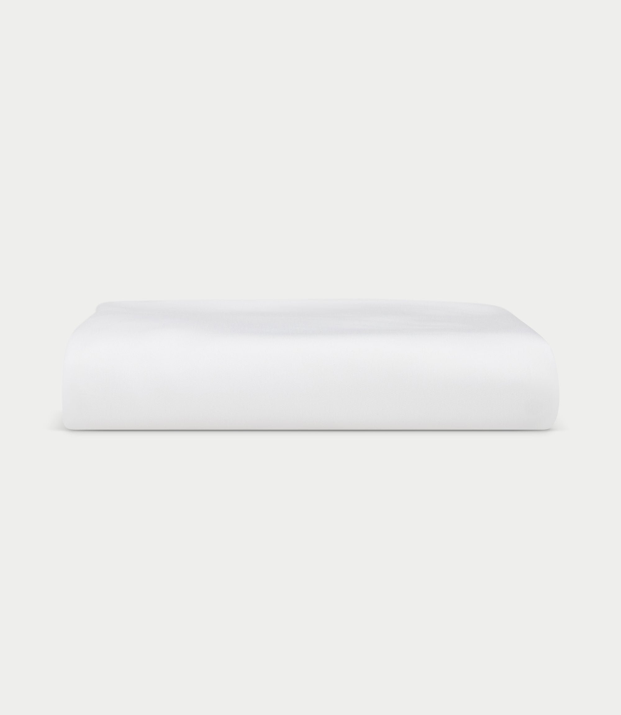 White fitted sheet folded with white background 