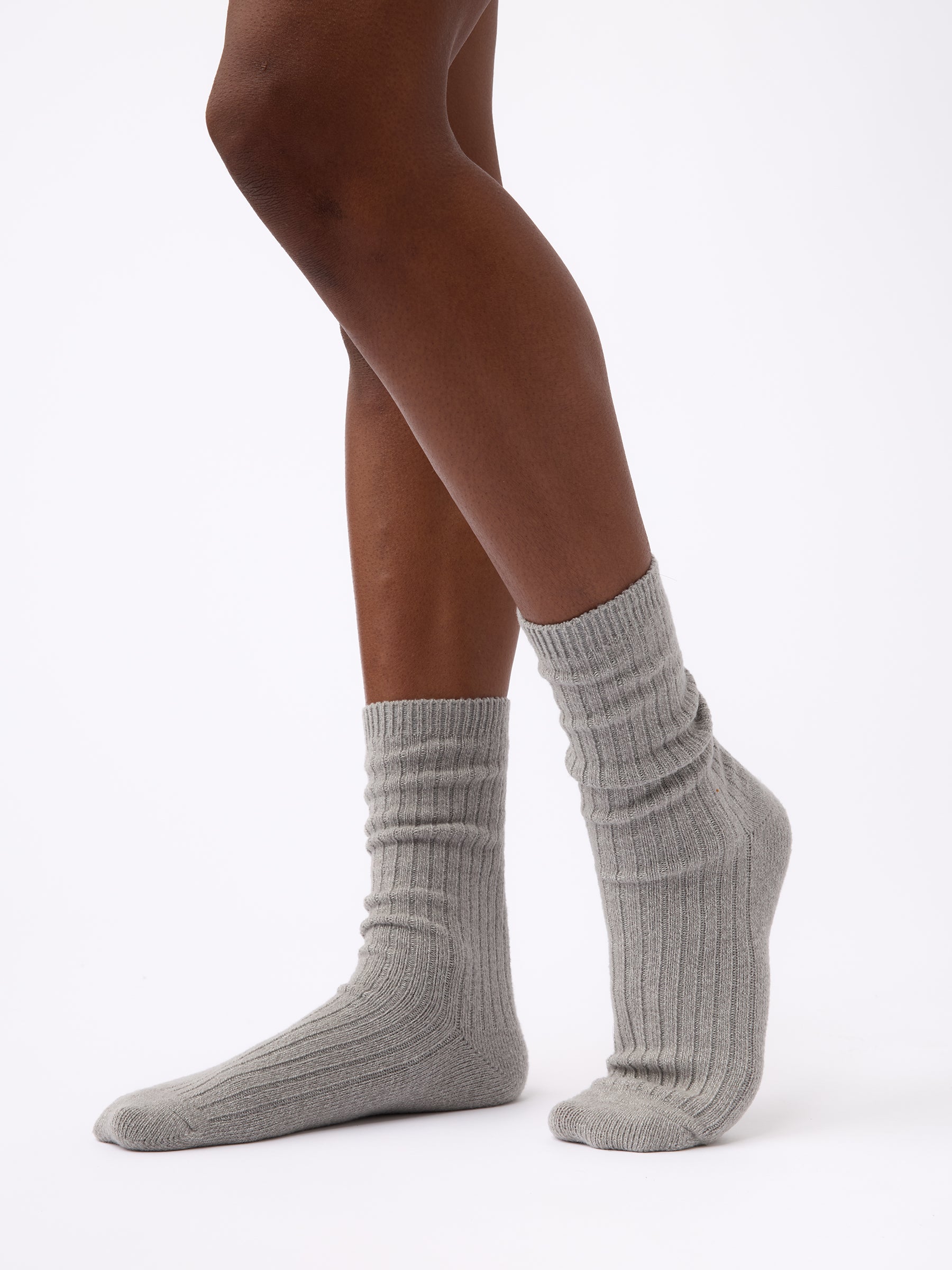 Person wearing Cozy Earth Plush Lounge Calf Sock in Stone 