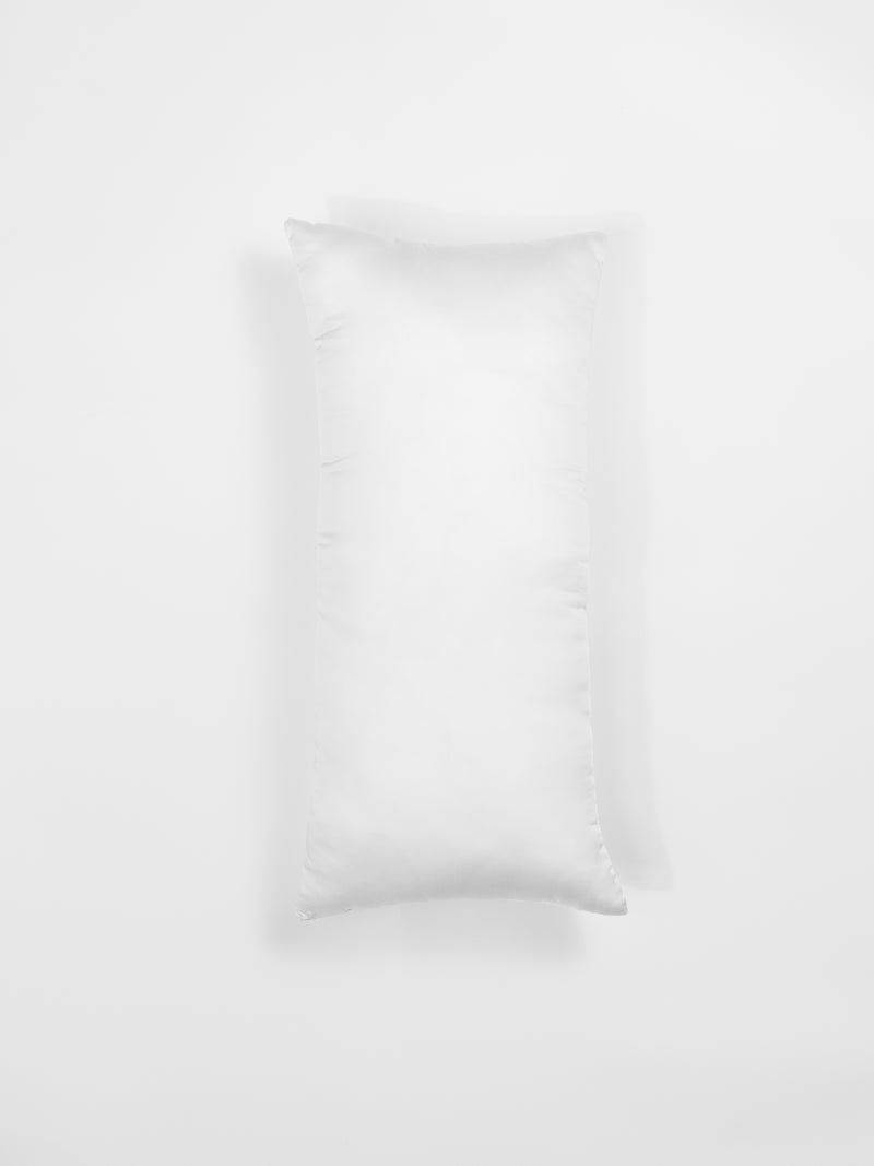 A white rectangular pillow from Cozy Earth's Premium Down Alternative Insert collection against a plain white background. The pillow sports a clean and simple design, featuring a smooth surface with faint seams visible along the edges.