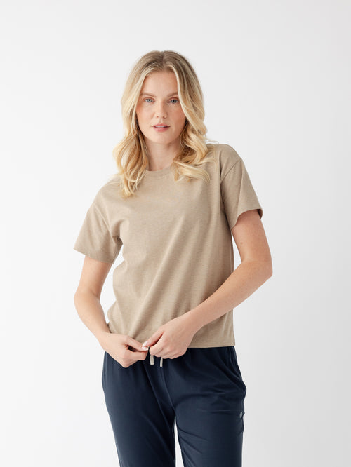 Woman wearing beech heather tee with white background |Color:Beech Heather