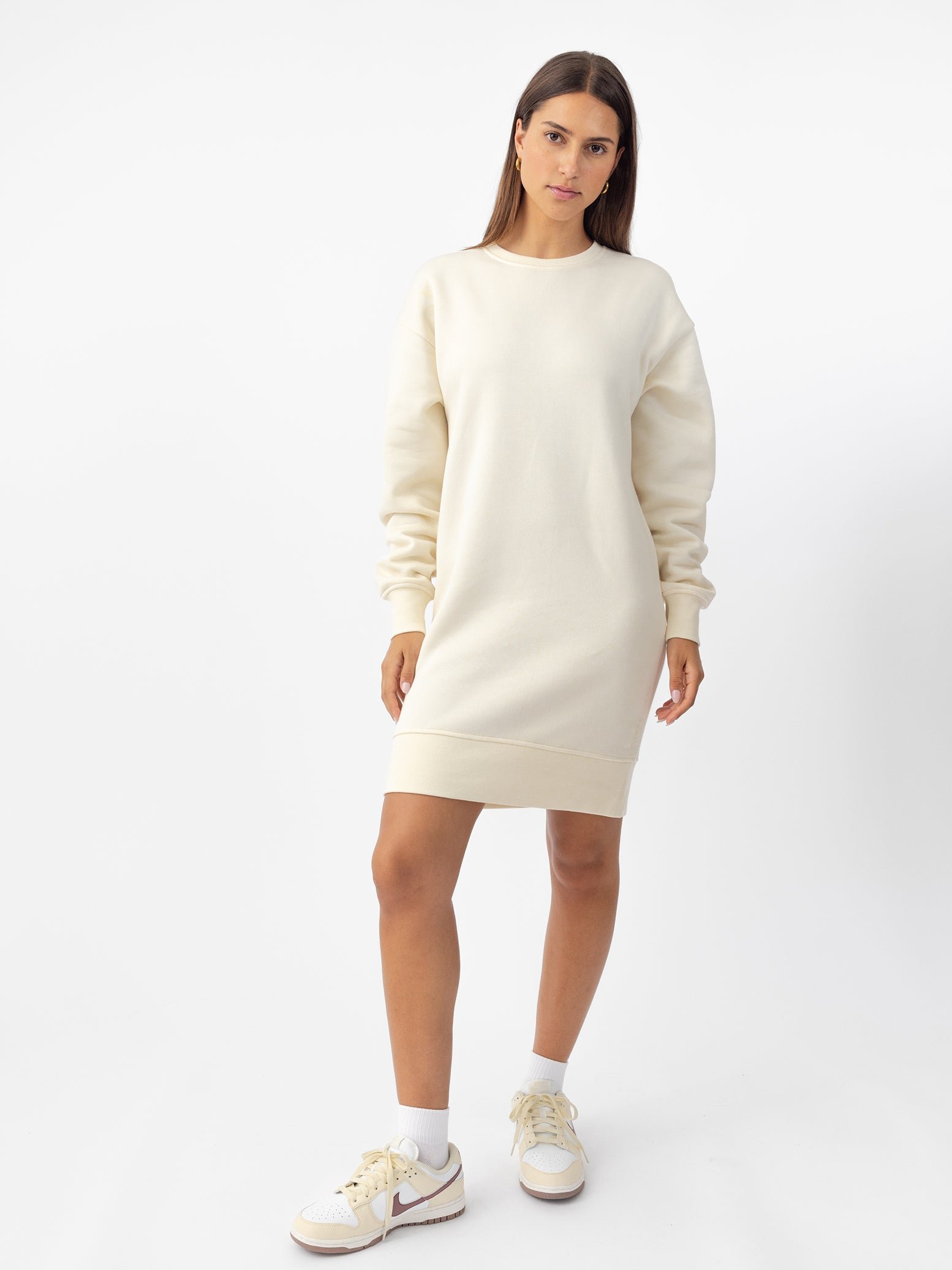 Woman wearing Alabaster CityScape Crewneck Dress with white background |Color: Alabaster