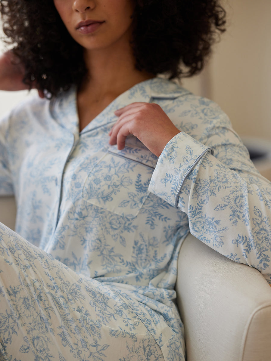 Woman on sofa wearing blue toile pajamas |Color:Blue Toile