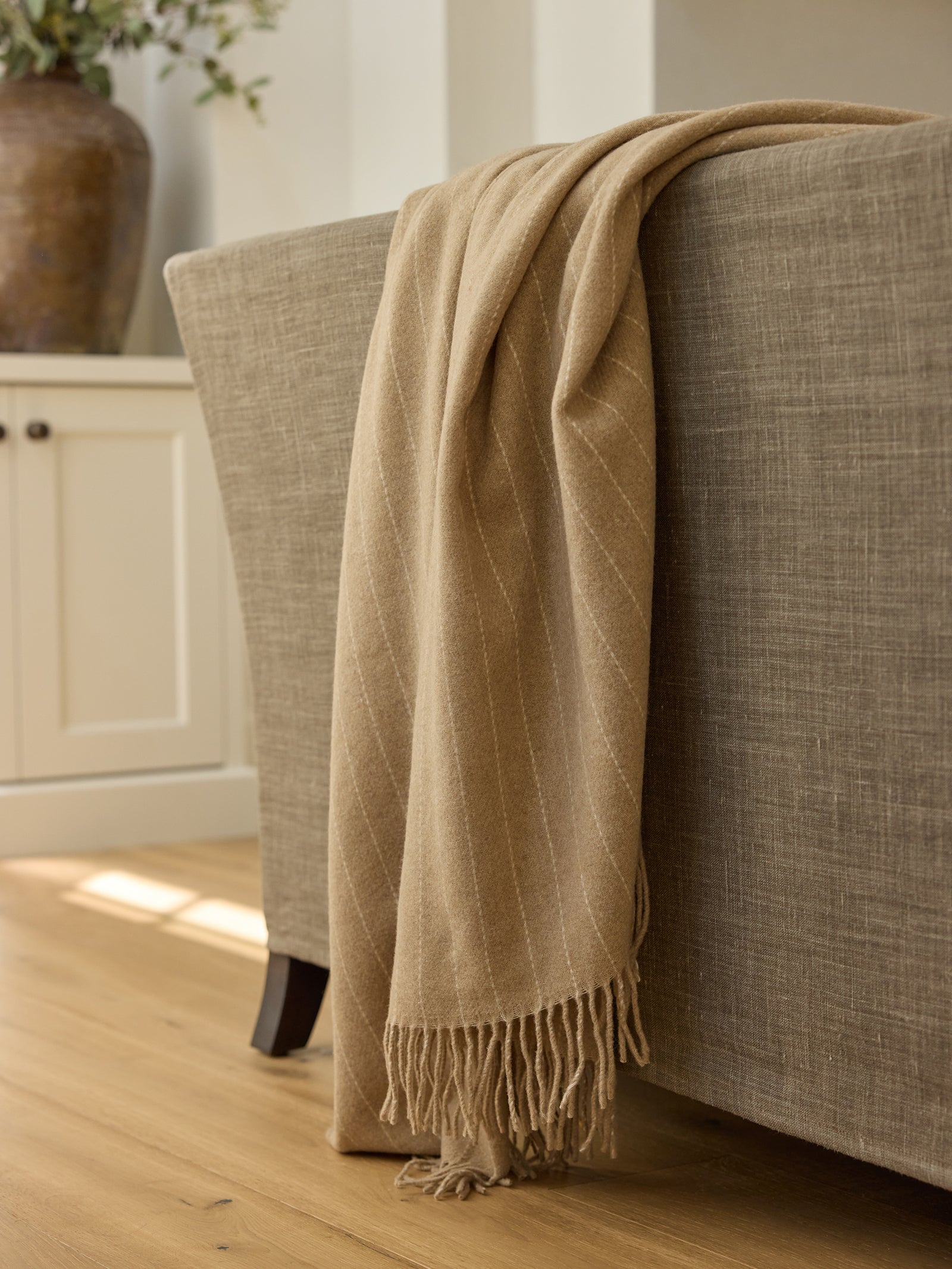 Brandy florence throw draped over sofa  