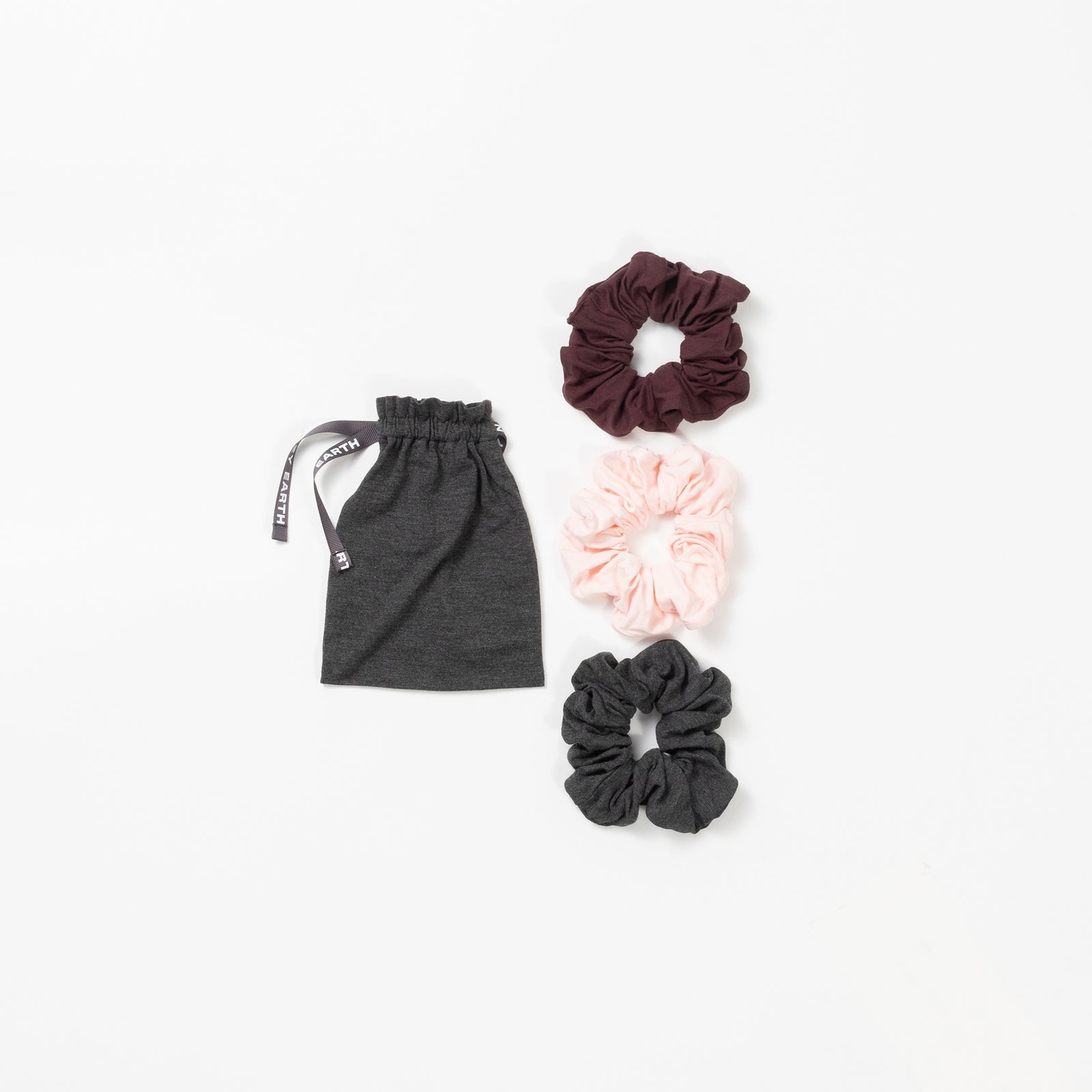 Three pack of scrunchies with burgundy, blossom, and charcoal options 