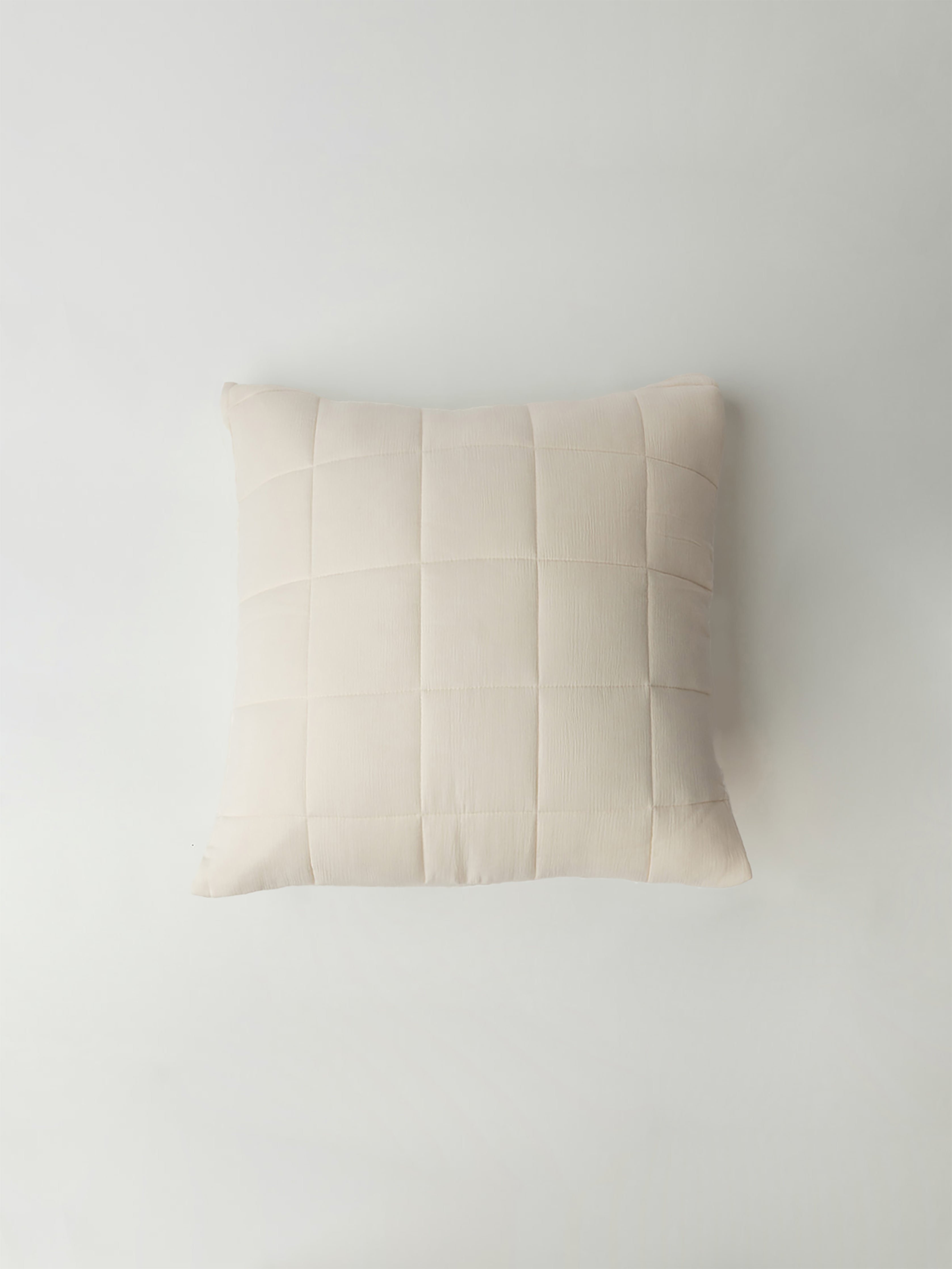 Buttermilk Aire Bamboo Box Quilt Euro Sham. The sham is photographed with a white background|Color:Buttermilk|Size:Euro