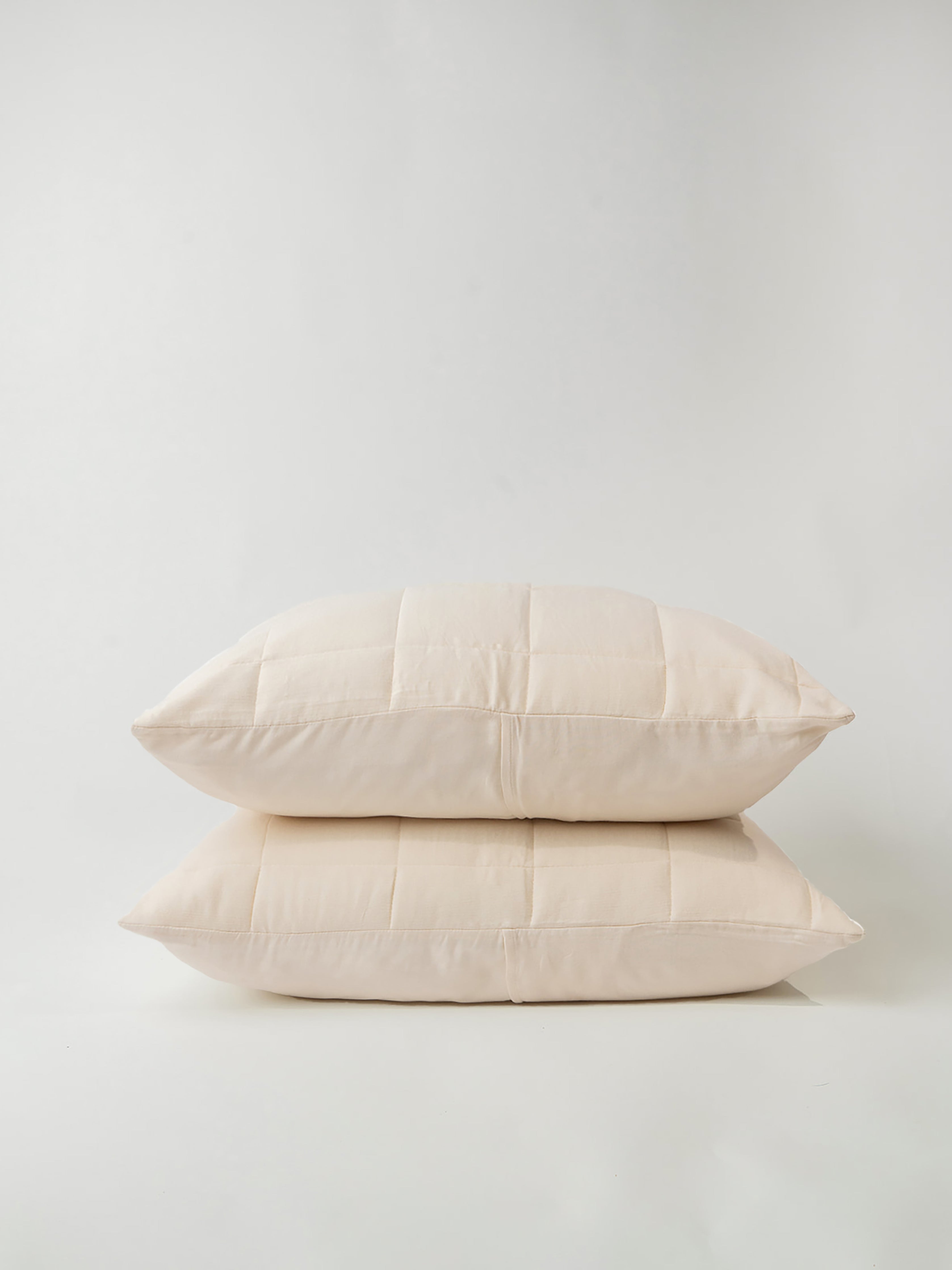 Buttermilk Aire Bamboo Box Quilt Euro Sham standard size. The sham is resting on a white background|Color:Buttermilk|Size:Standard