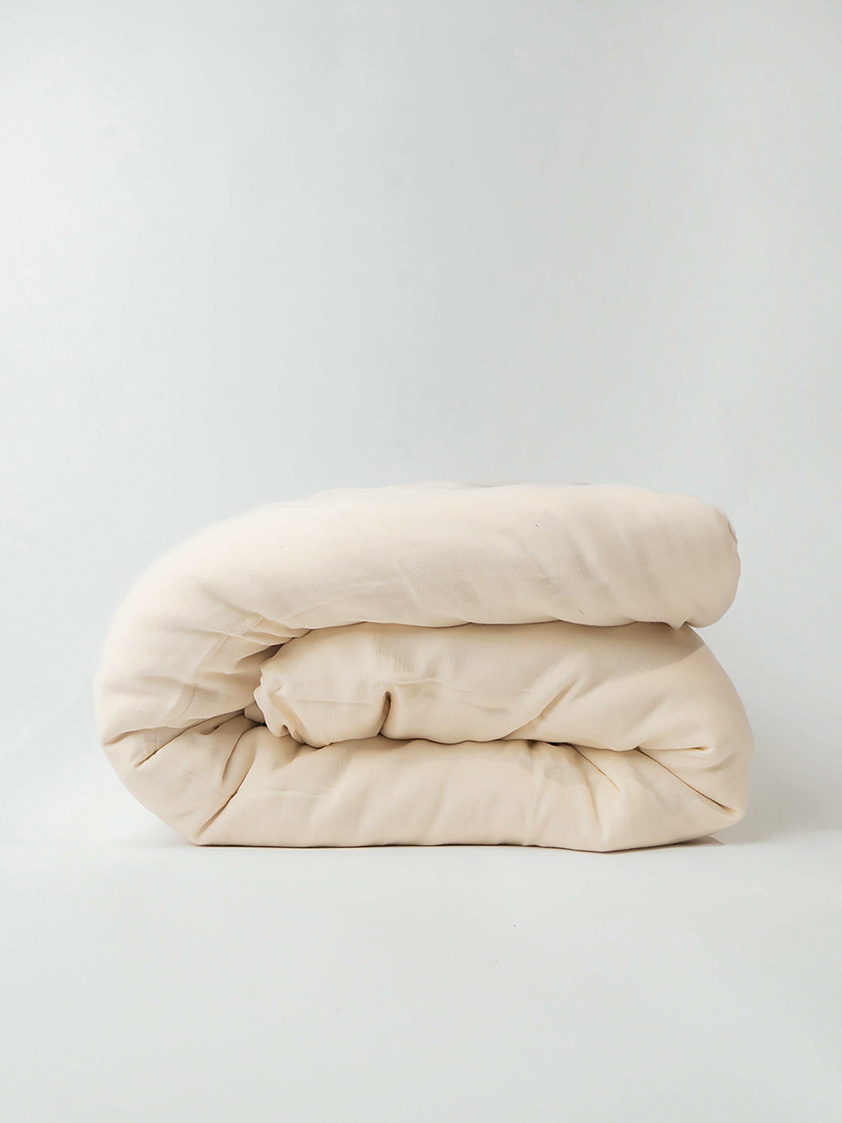 Buttermilk Aire Bamboo Duvet Cover. The Duvet Cover has been photographed with a white background.|Color:Buttermilk