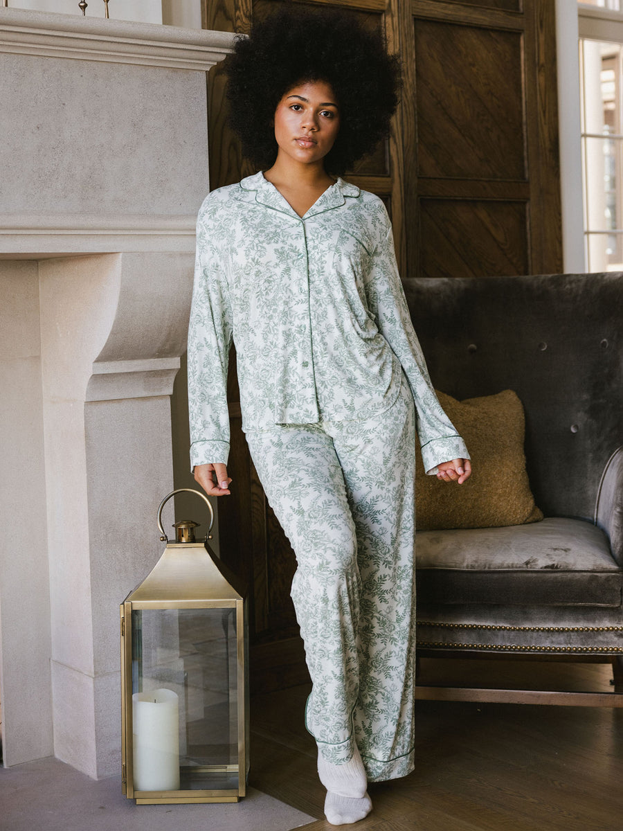 Woman standing in living room in celadon toile pajama set |Color:Celadon Toile