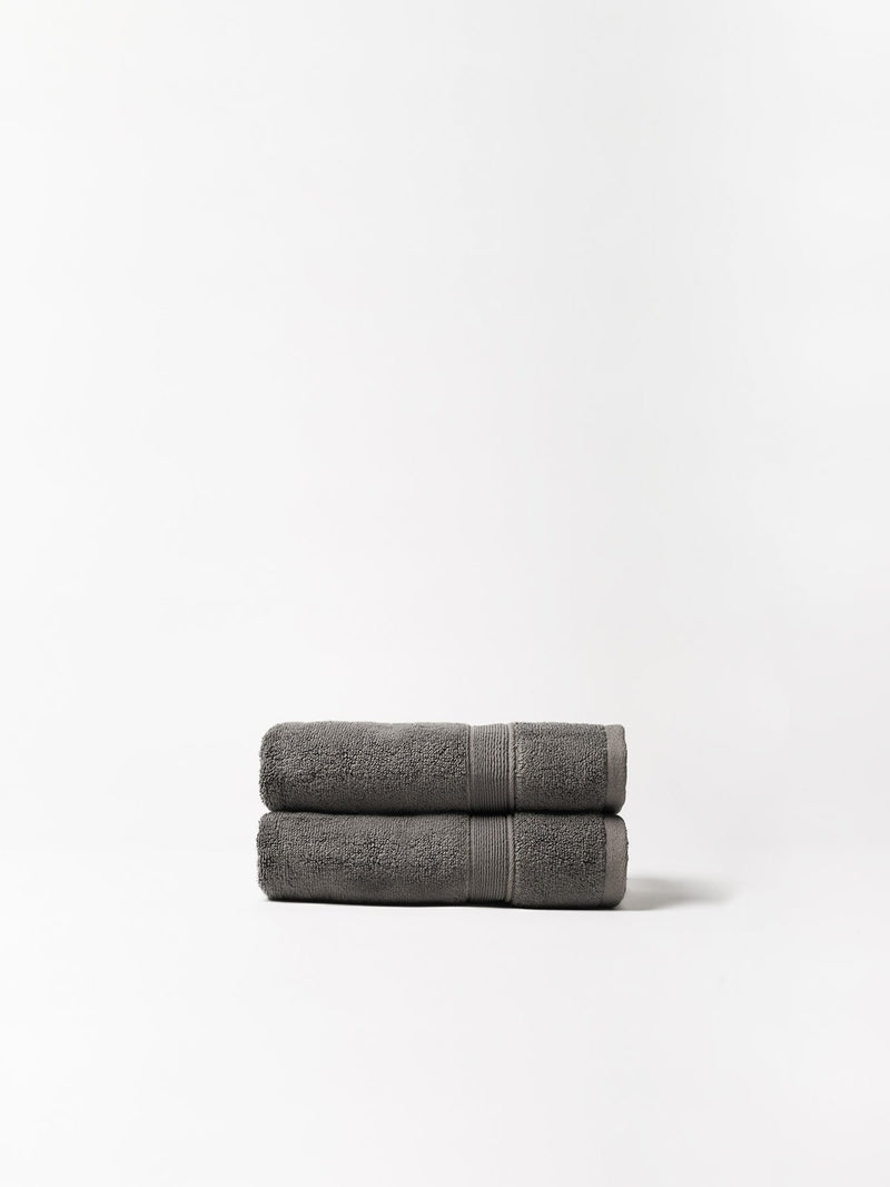 Charcoal hand towels folded with white background
