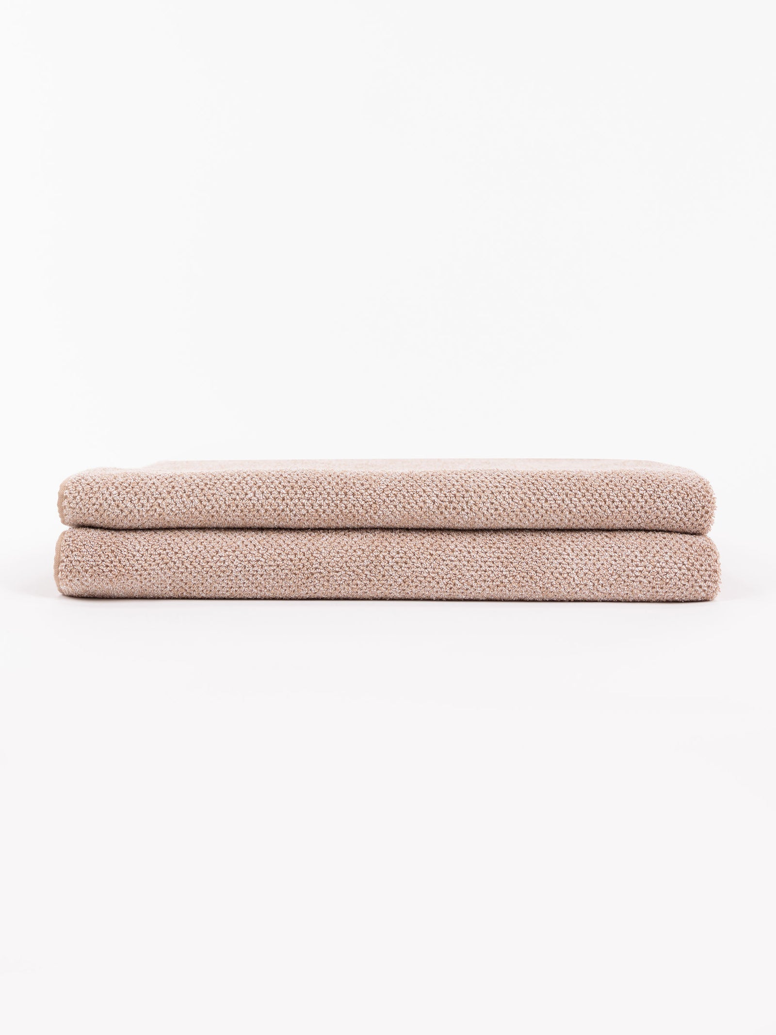 A pair of folded Nantucket Bath Sheets 