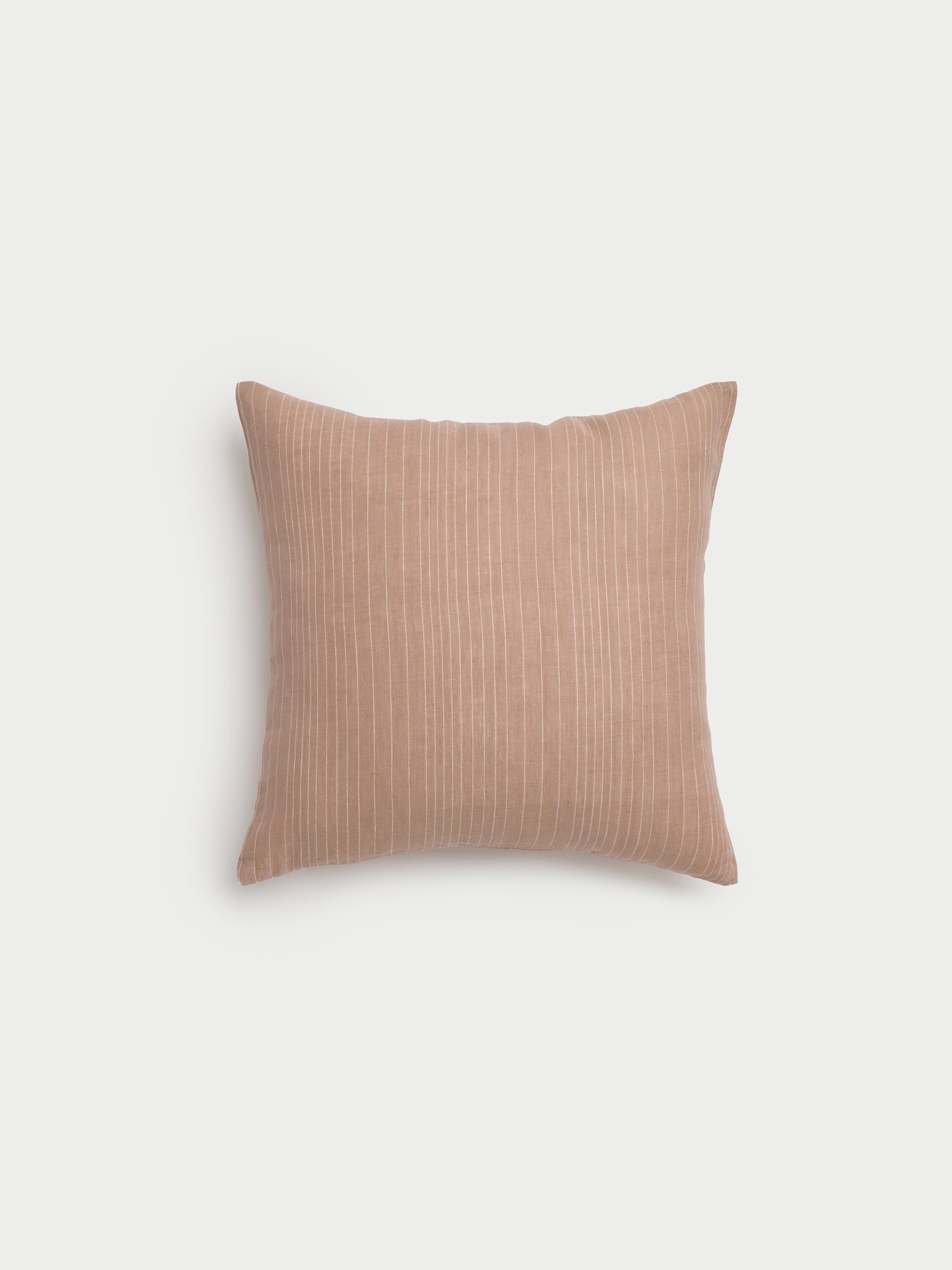 Cozy Earth striped throw pillow with plain white background 