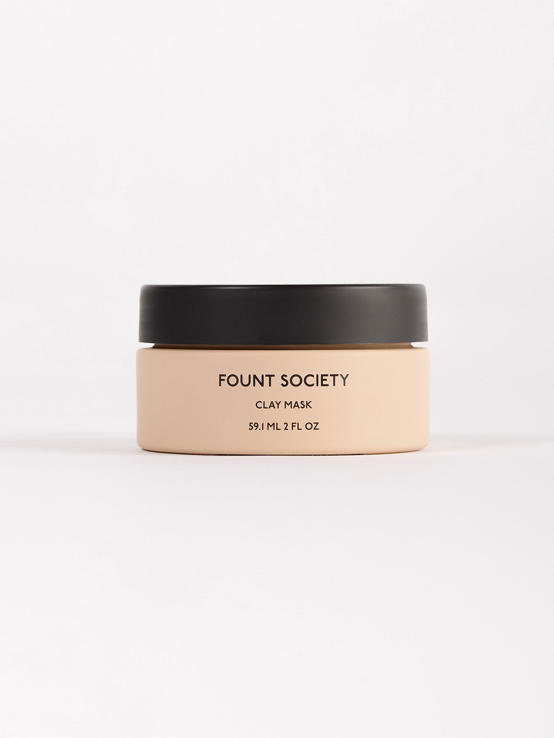 A beige 2 OZ jar with a black lid labeled "Cozy Earth Clay Mask 59.1 ml 2 fl oz" sits on a white background.|Size:2 OZ