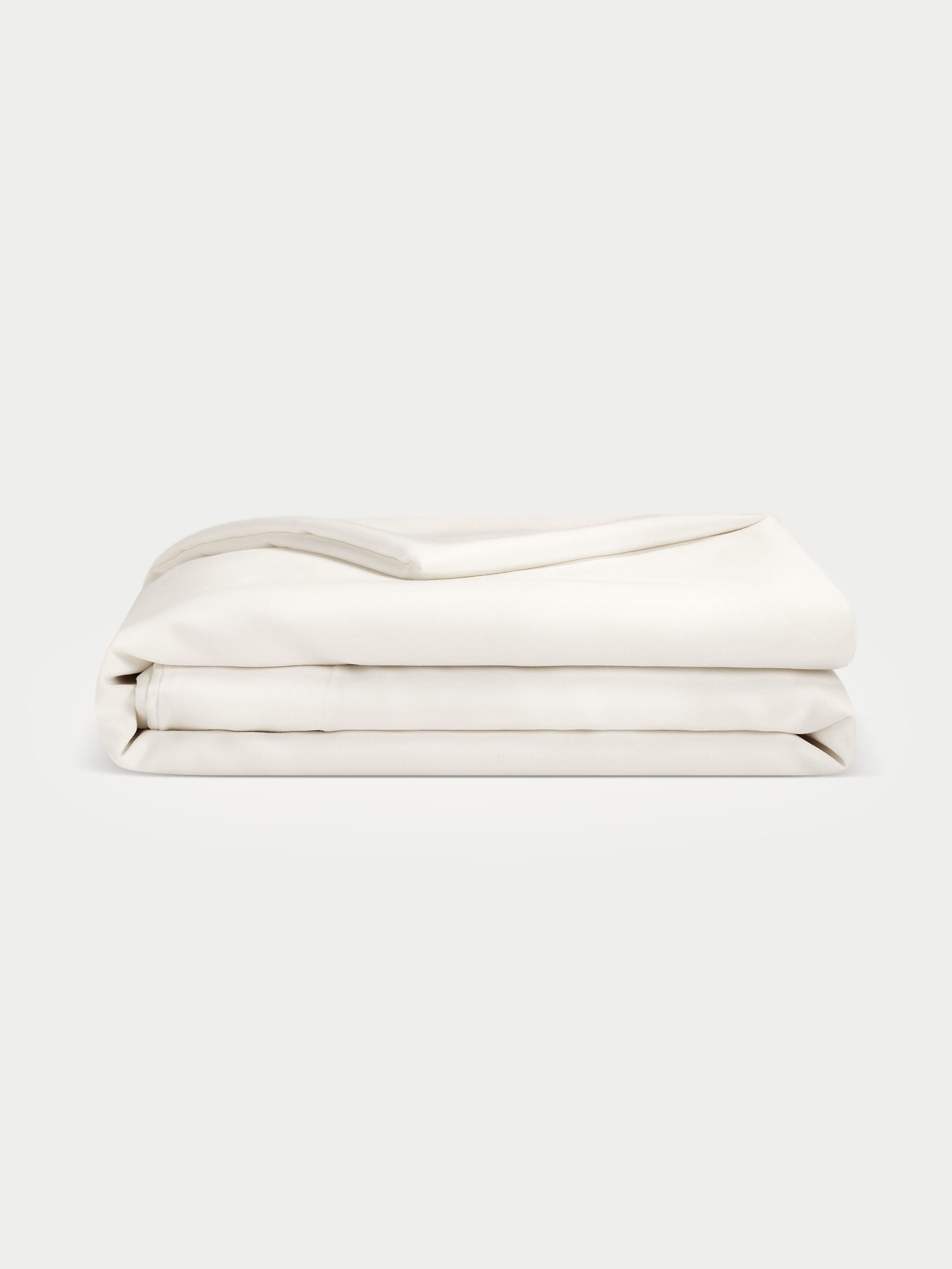 Creme duvet cover with white background 