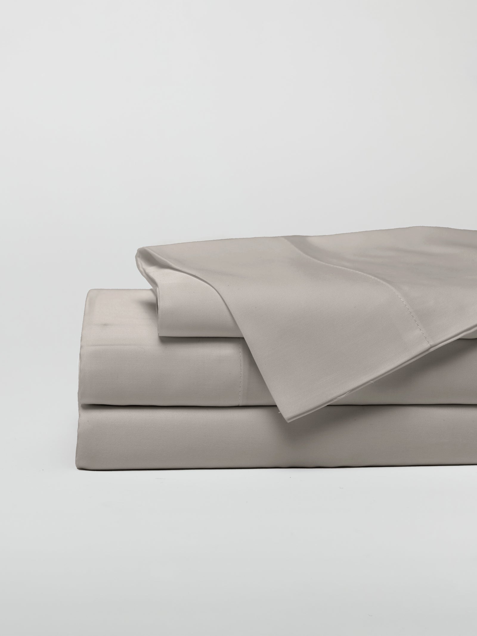 Dove Grey sheet set folded up with white background 