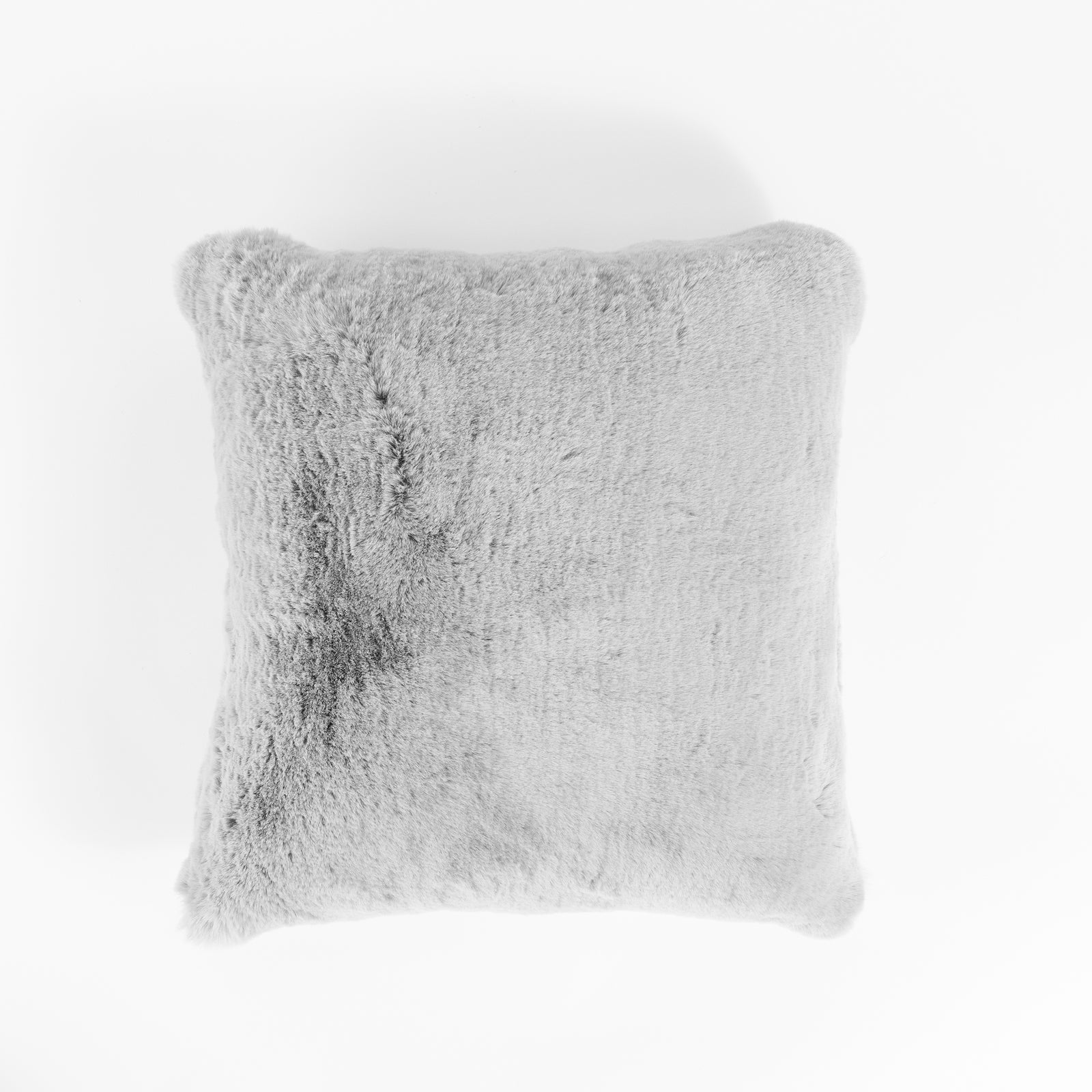 The Cuddle Pillow by Cozy Earth, a plush and cozy square faux fur pillow in gray, is centered on a white background. It exudes comfort and warmth. 