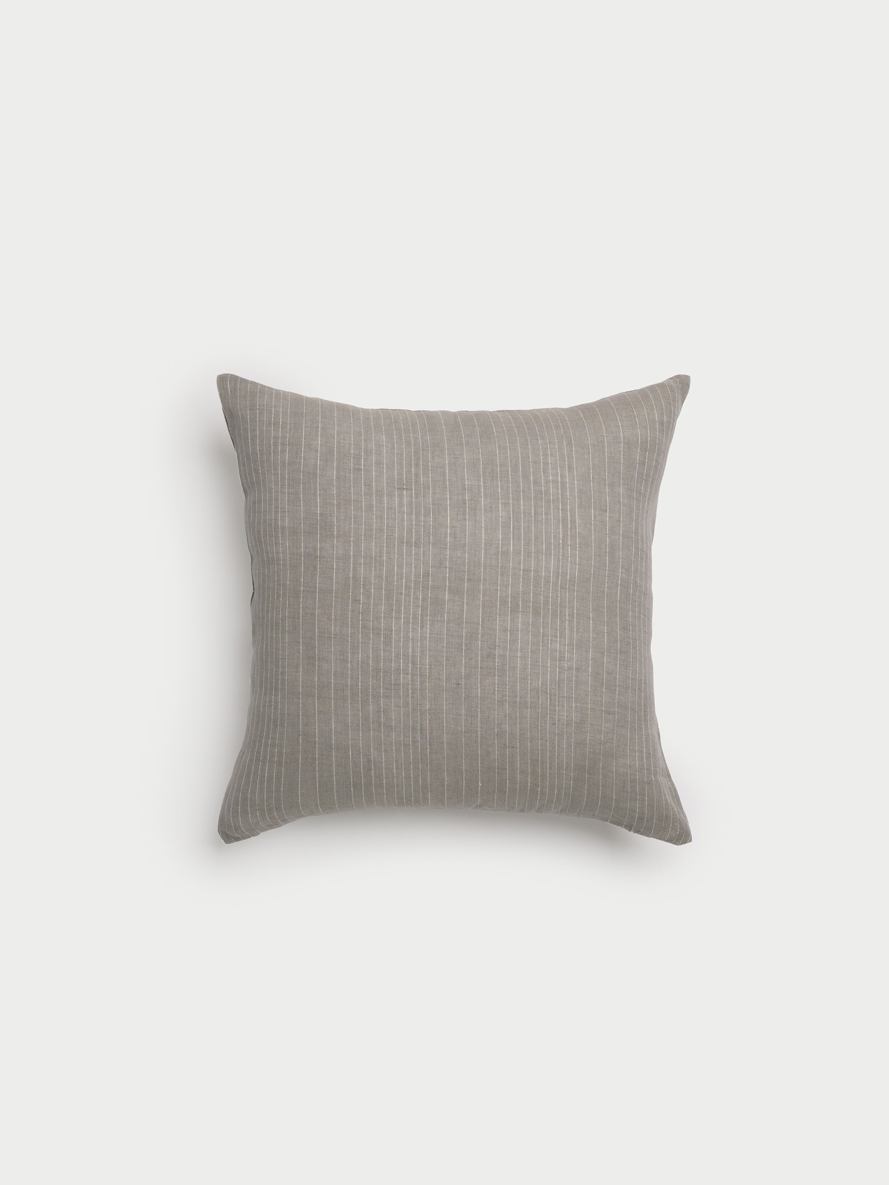 Cozy Earth striped throw pillow with plain white background 